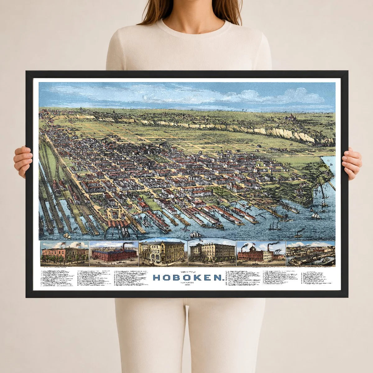 Restored and colorized 1881 bird’s-eye view map of Hoboken, New Jersey, showing historic streets, Hudson River waterfront, railroads, piers, steamers, churches, factories, homes, and landmarks.