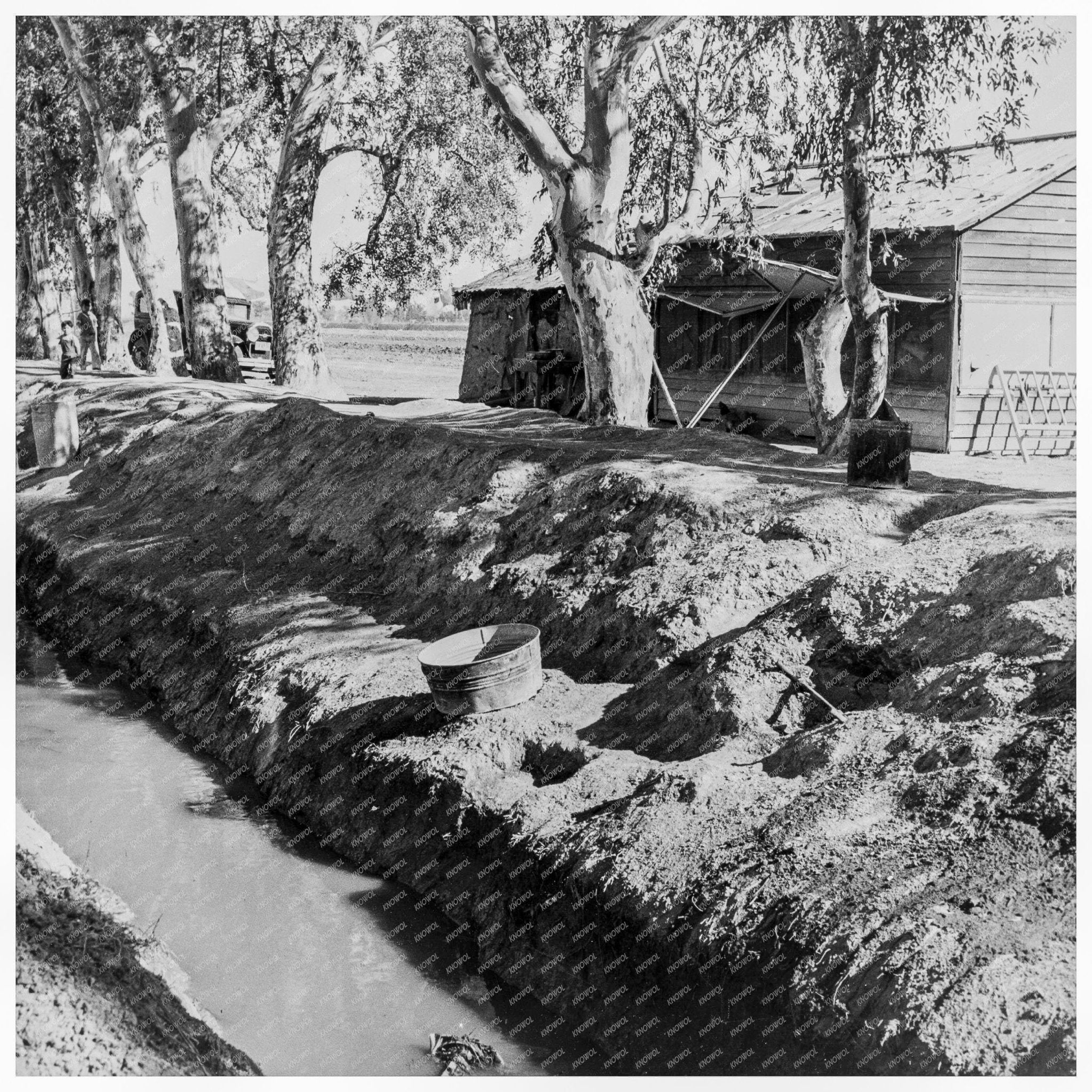 1937 Vintage Photo of Ditch Bank Housing for Migrant Workers - Available at KNOWOL