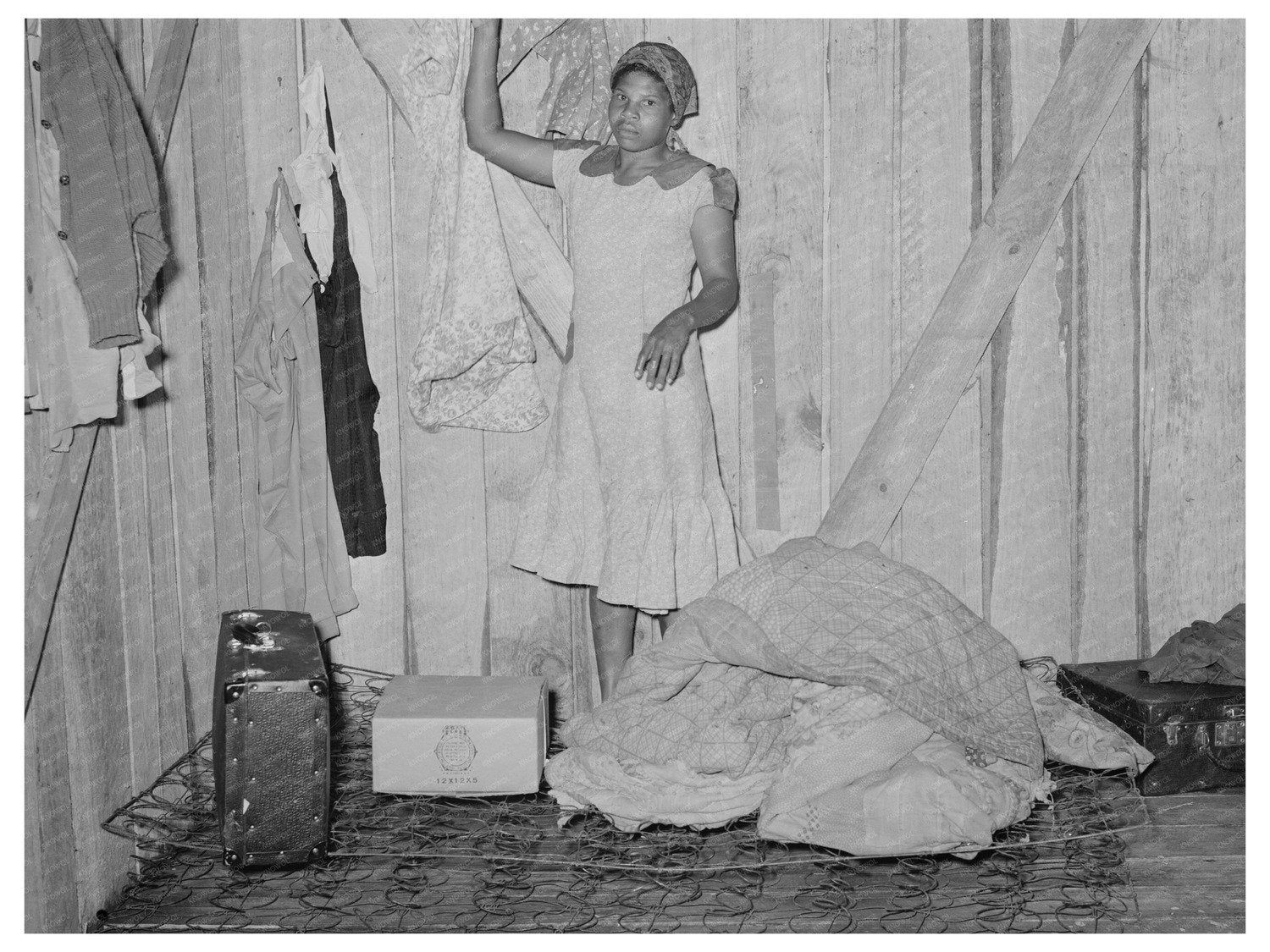 1939 Woman Arranging Quarters as Strawberry Picker Louisiana - Available at KNOWOL