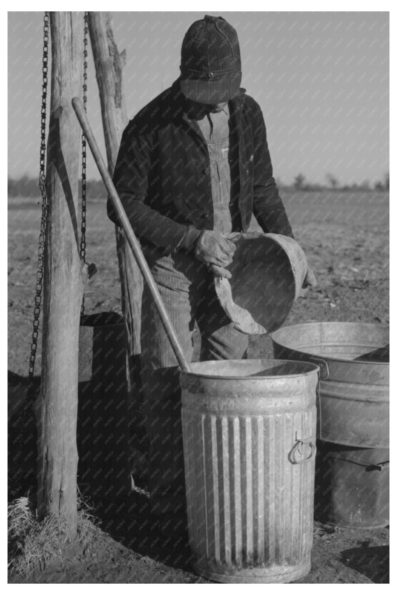 1940 Vintage Farm Life Pouring Bran for Hog Mash - Available at KNOWOL