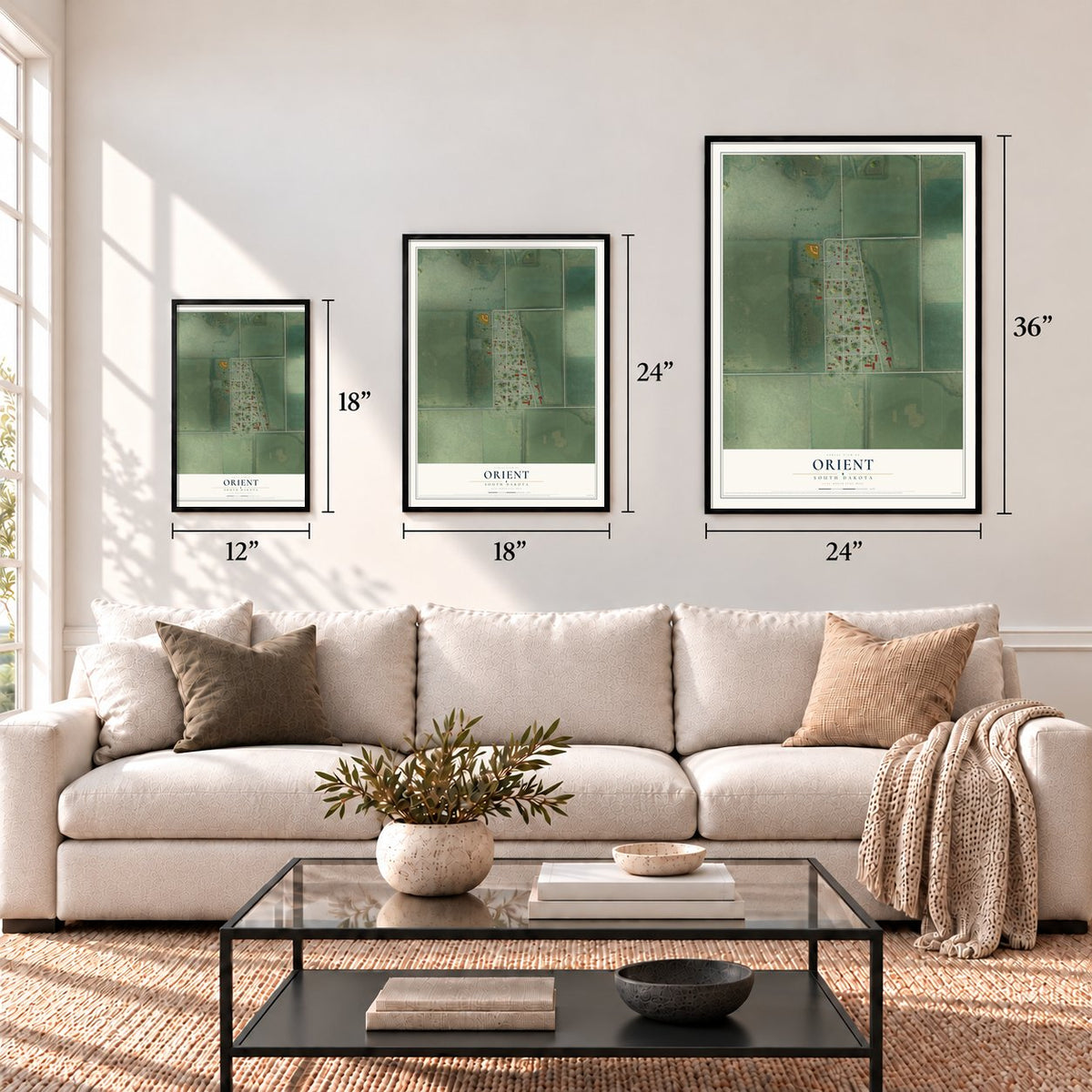 Orient, South Dakota map in 12 x 18, 18 x 24 and 24 x 36 inch sizes above a sofa