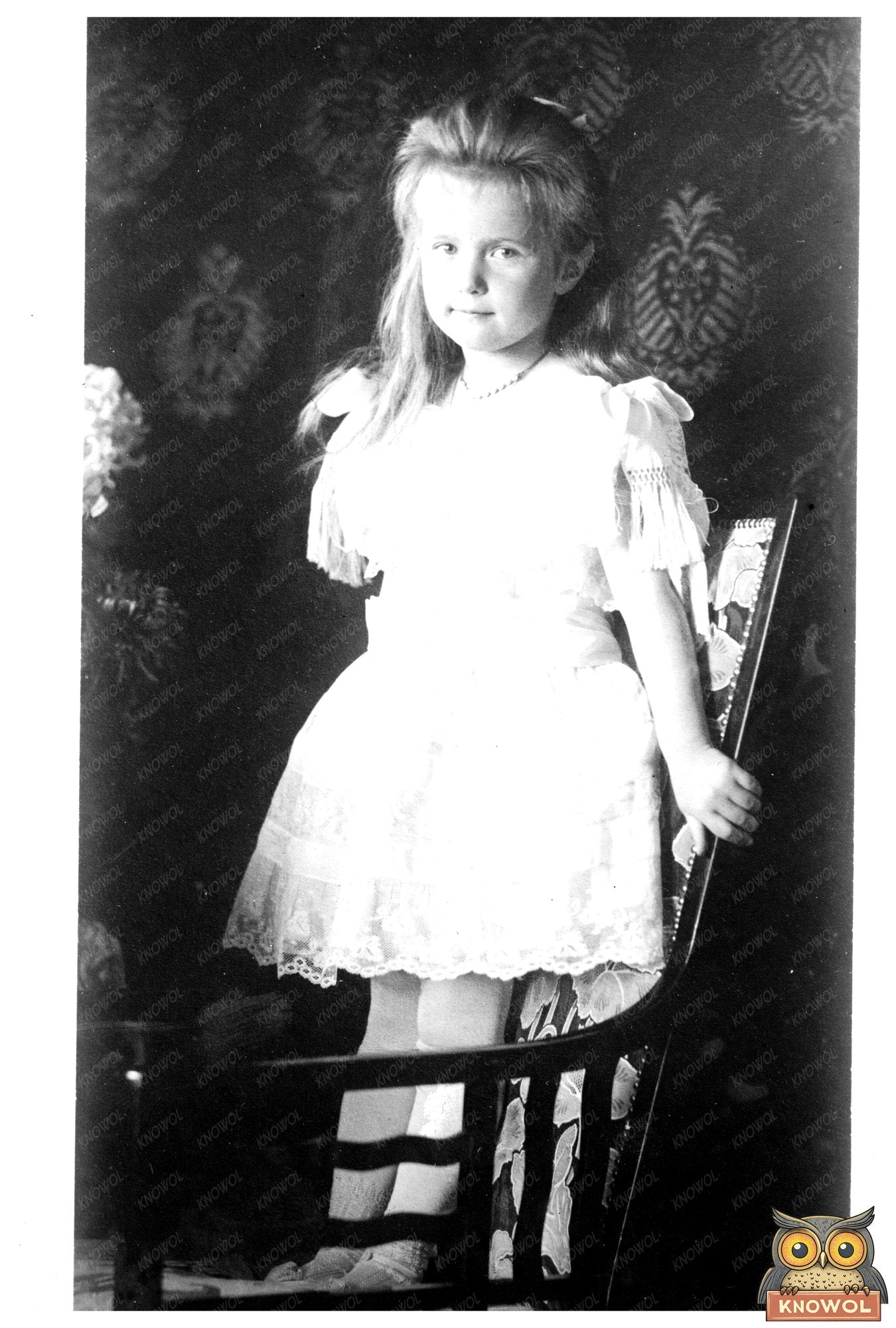 Grand Duchess Anastasie Boldly Posing on a Chair