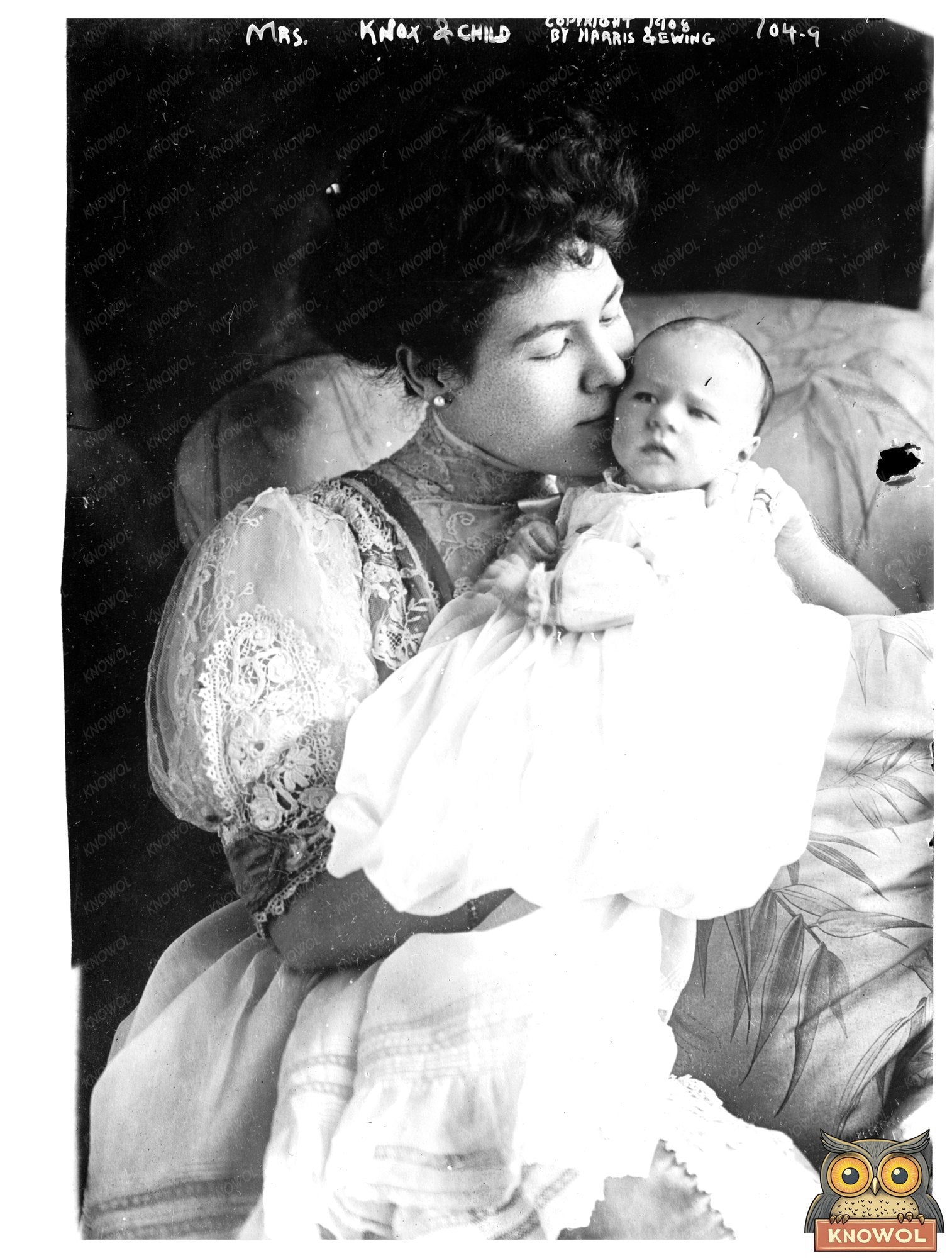 1908 Gentle Embrace: A Mother and Her Baby