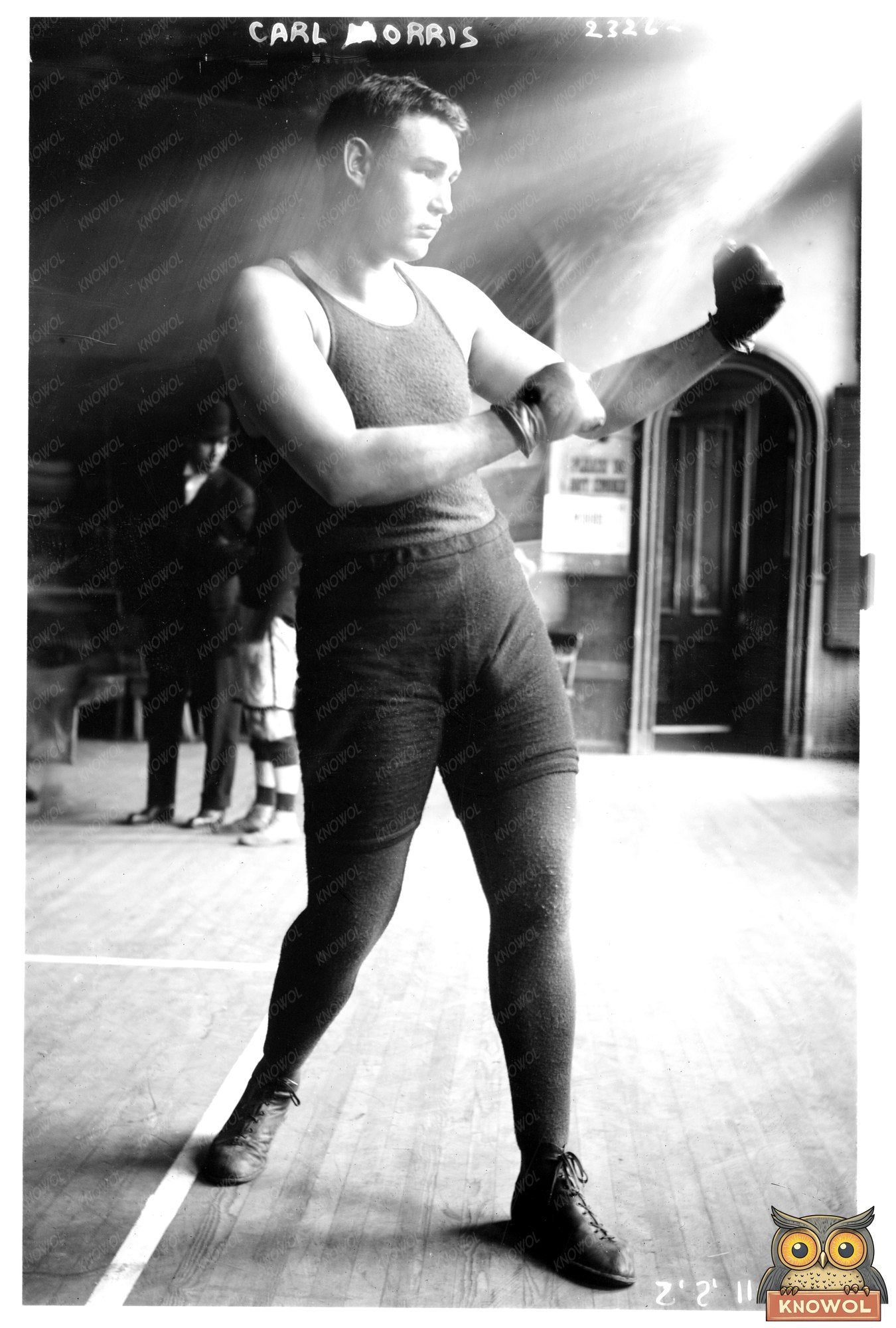 Historic 1911 Boxing Match: Carl Morris in Action