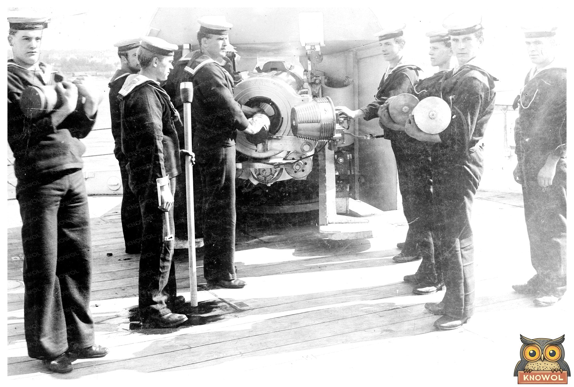 “Historic British Navy Crew Loading Naval Gun”