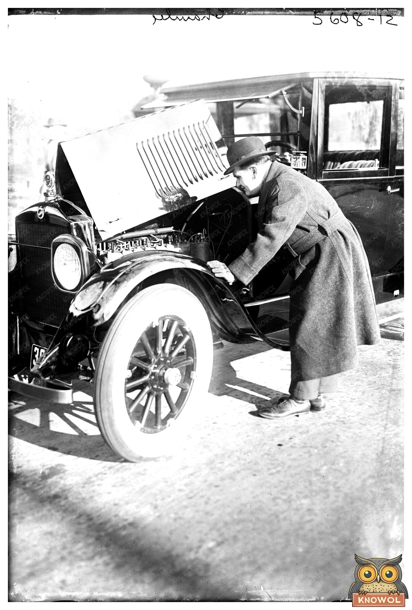 1920s Snapshot: Enthusiast Examines Vintage Auto Engine