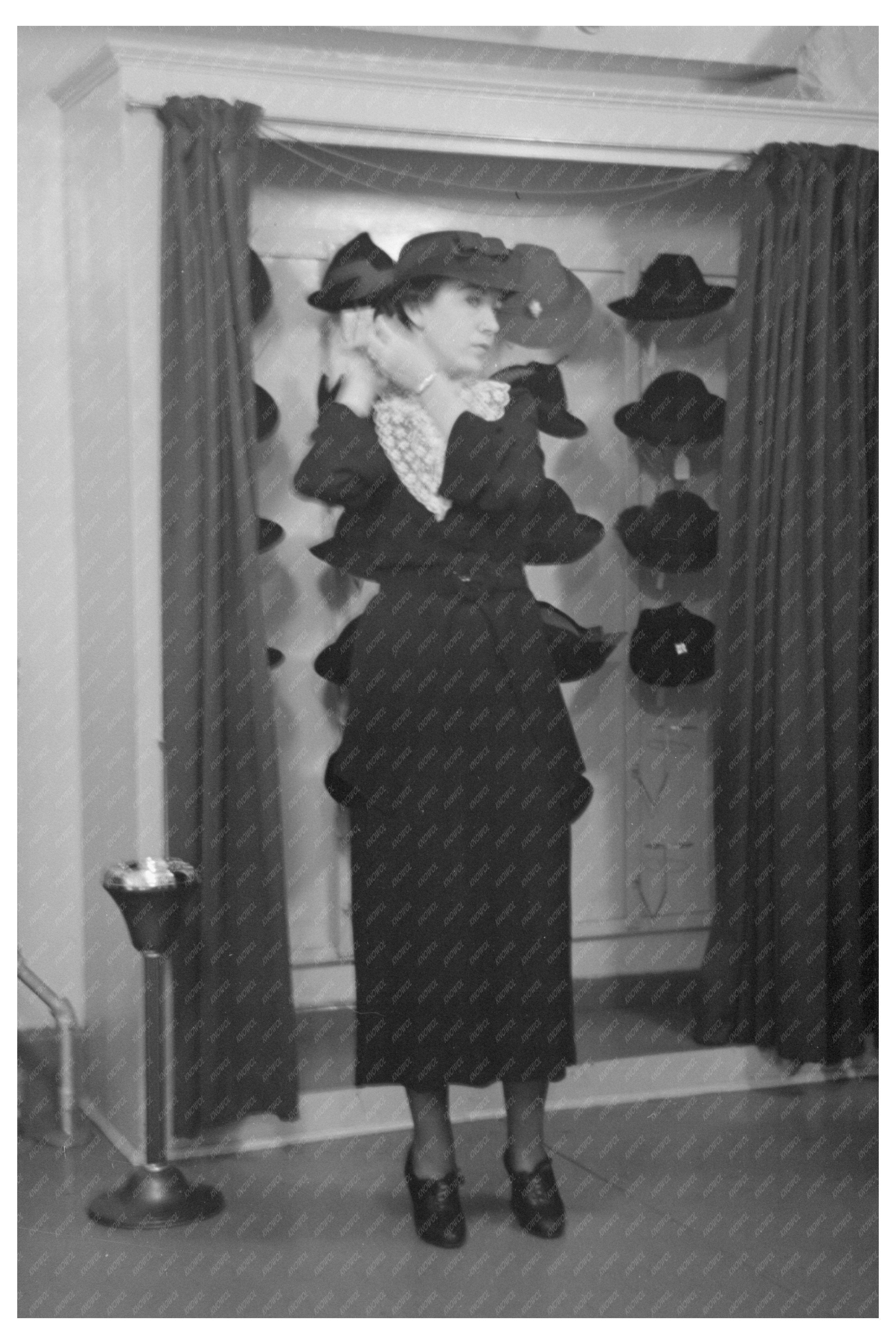 Model Trying Hat in New York City Showroom 1936