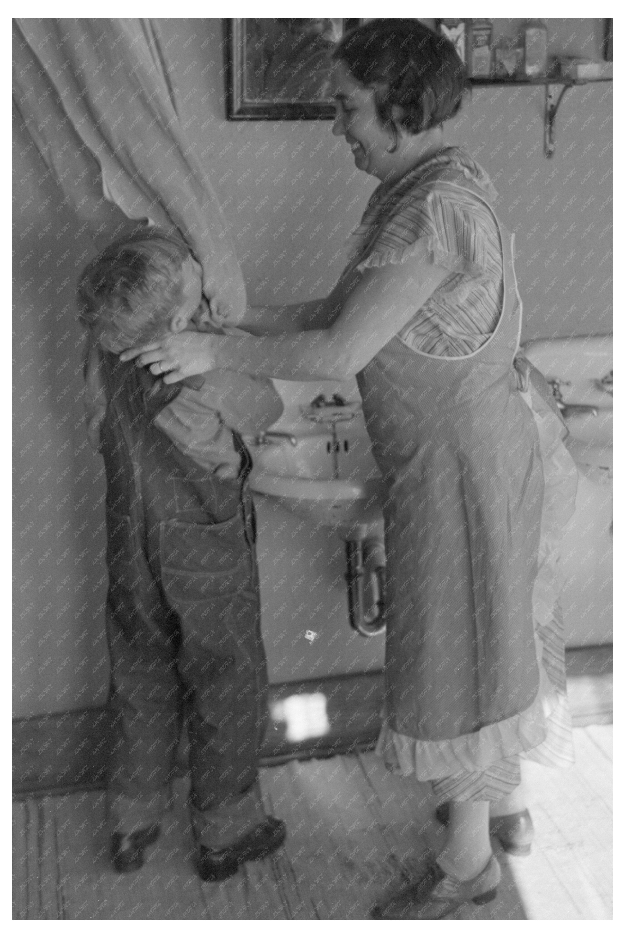 Mrs. Rustan Combing Sons Hair on Farm 1936