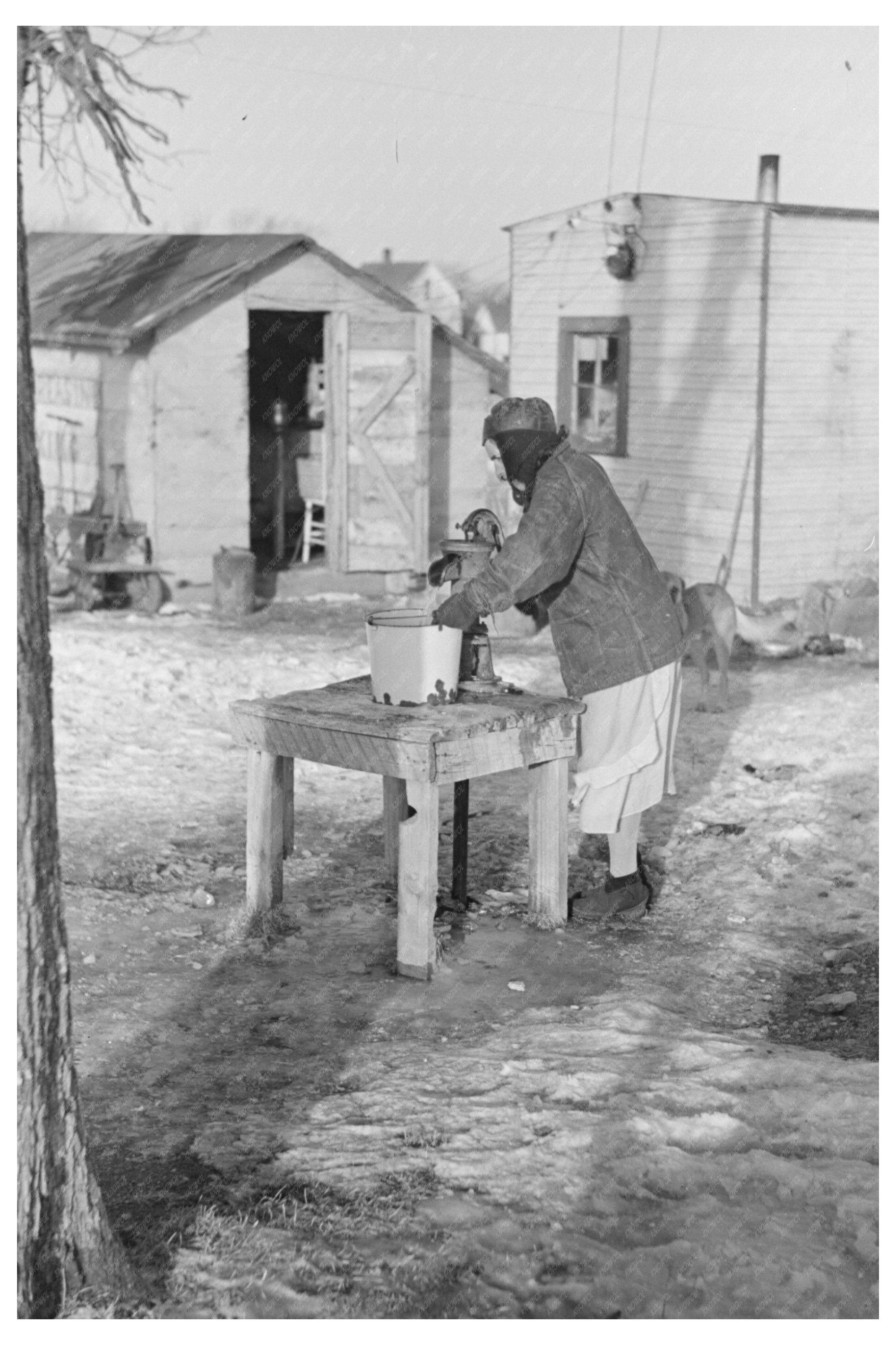 Woman Pumping Water in Spencer Iowa Shantytown 1936