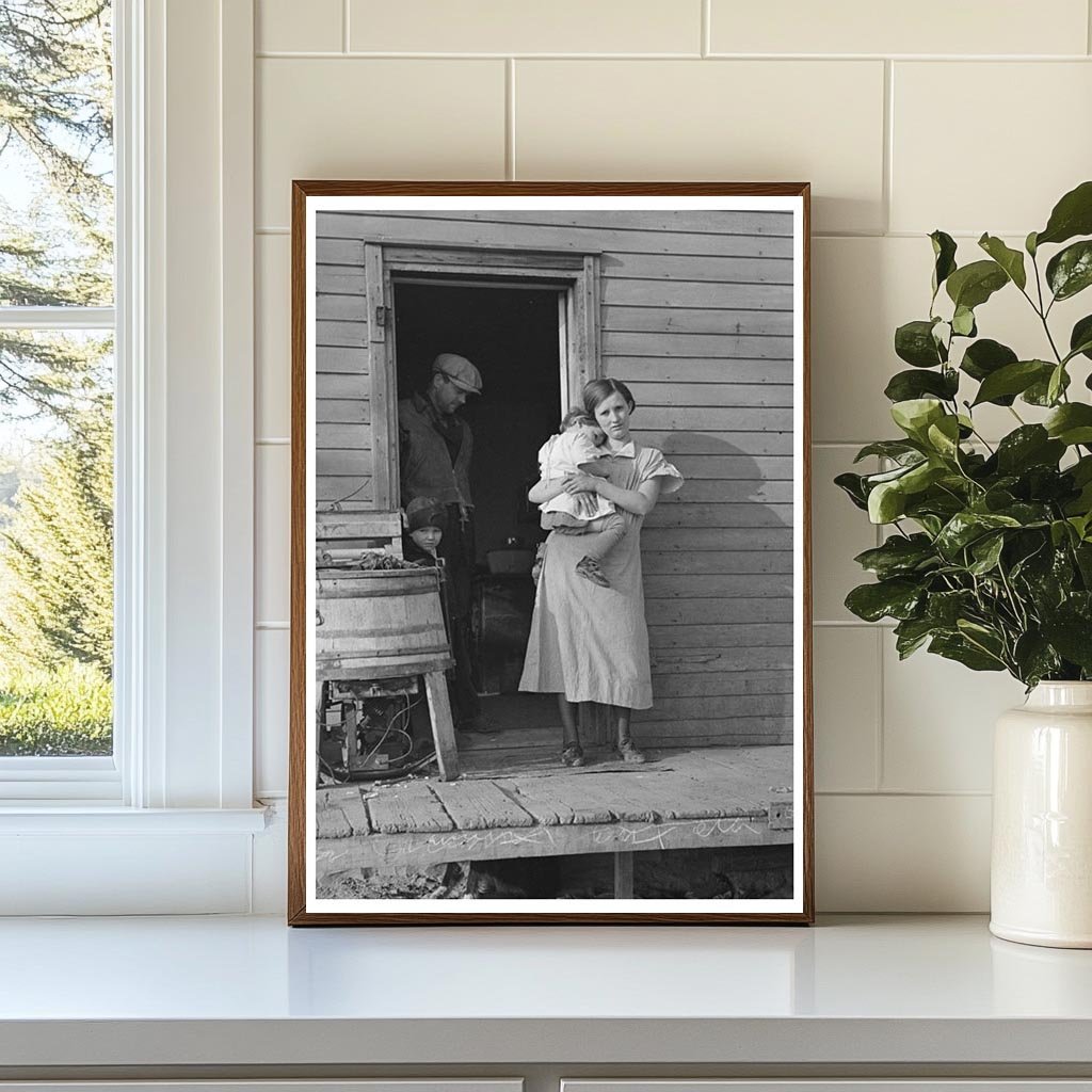 Mrs. Glen Cook with Baby in Little Sioux Township 1936