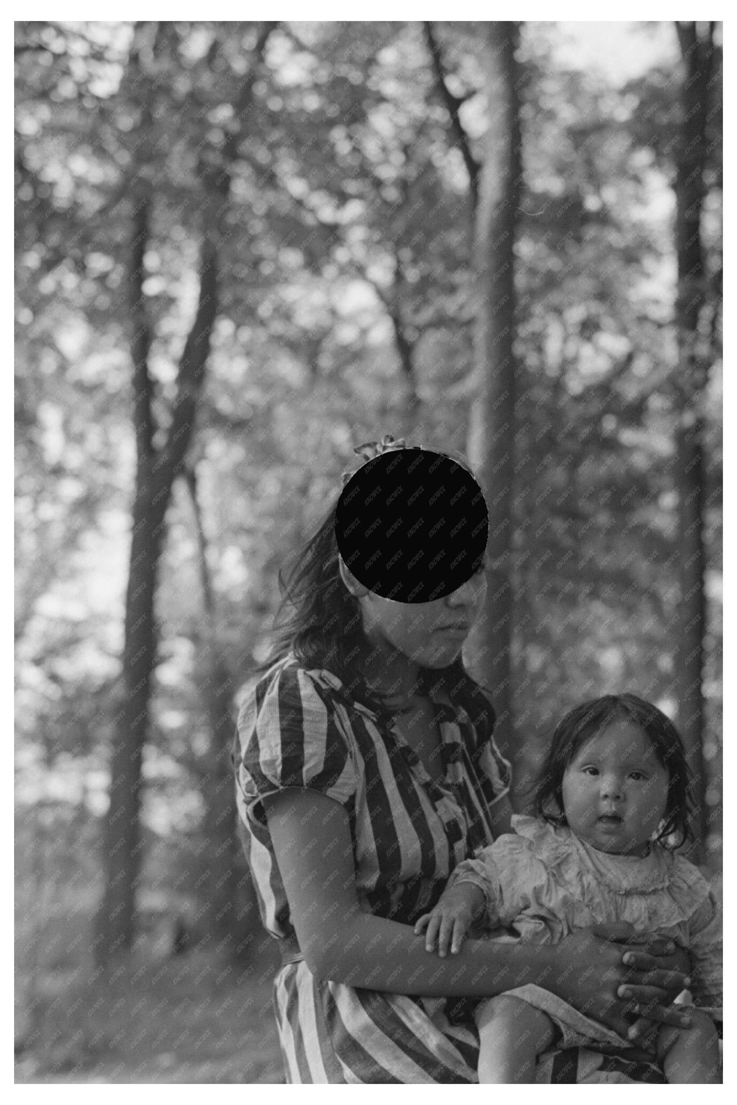 Indigenous Mother and Baby at Minnesota Blueberry Camp 1937