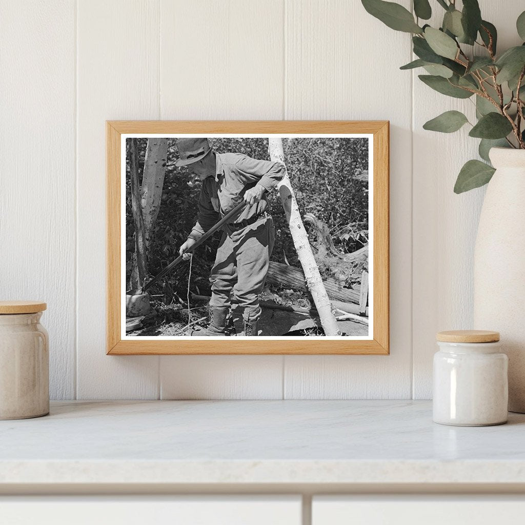 William Besson Removing Iron Pipe Drill in Winton 1937