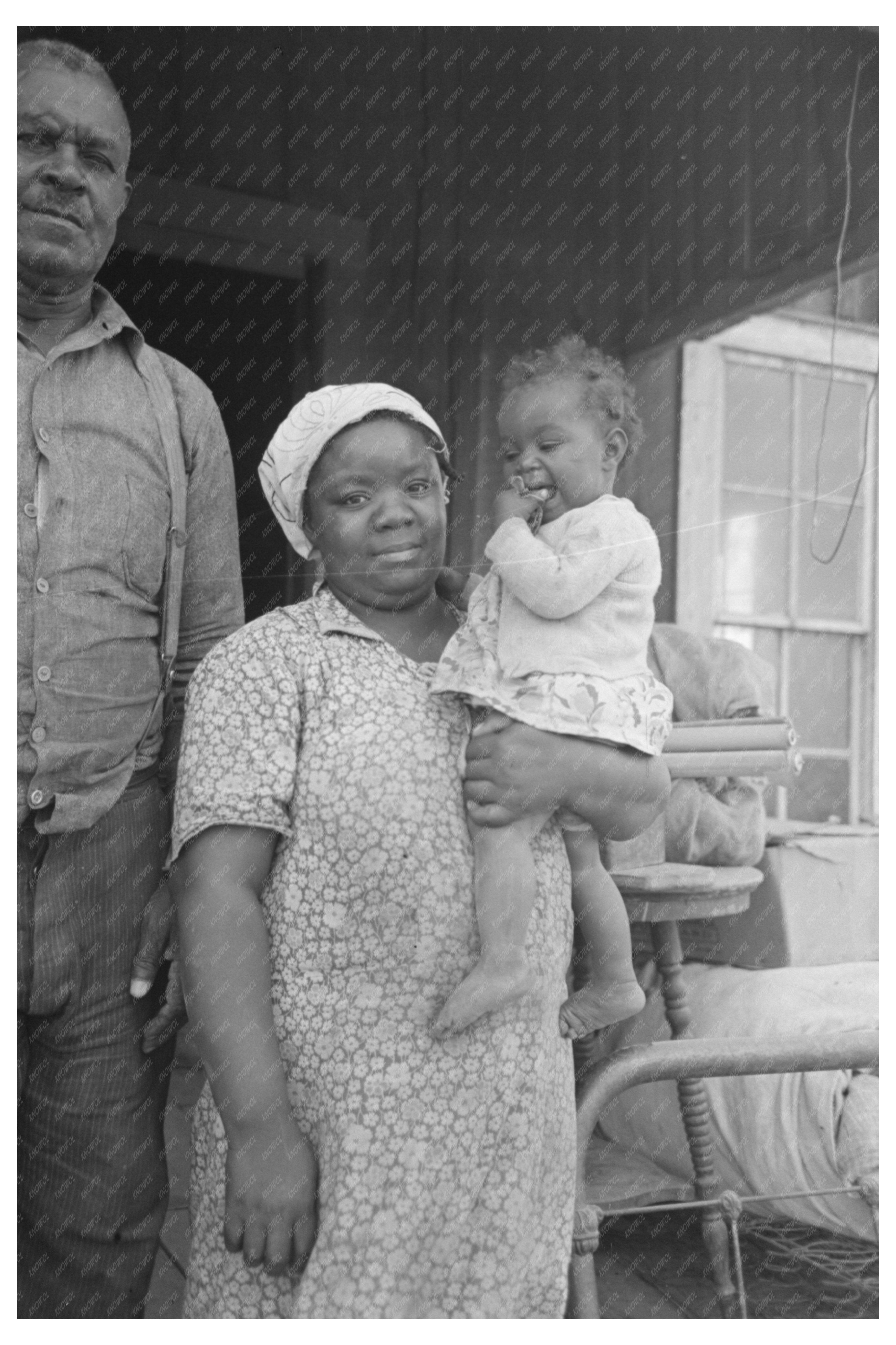 Mother and Child Preparing to Relocate May 1938