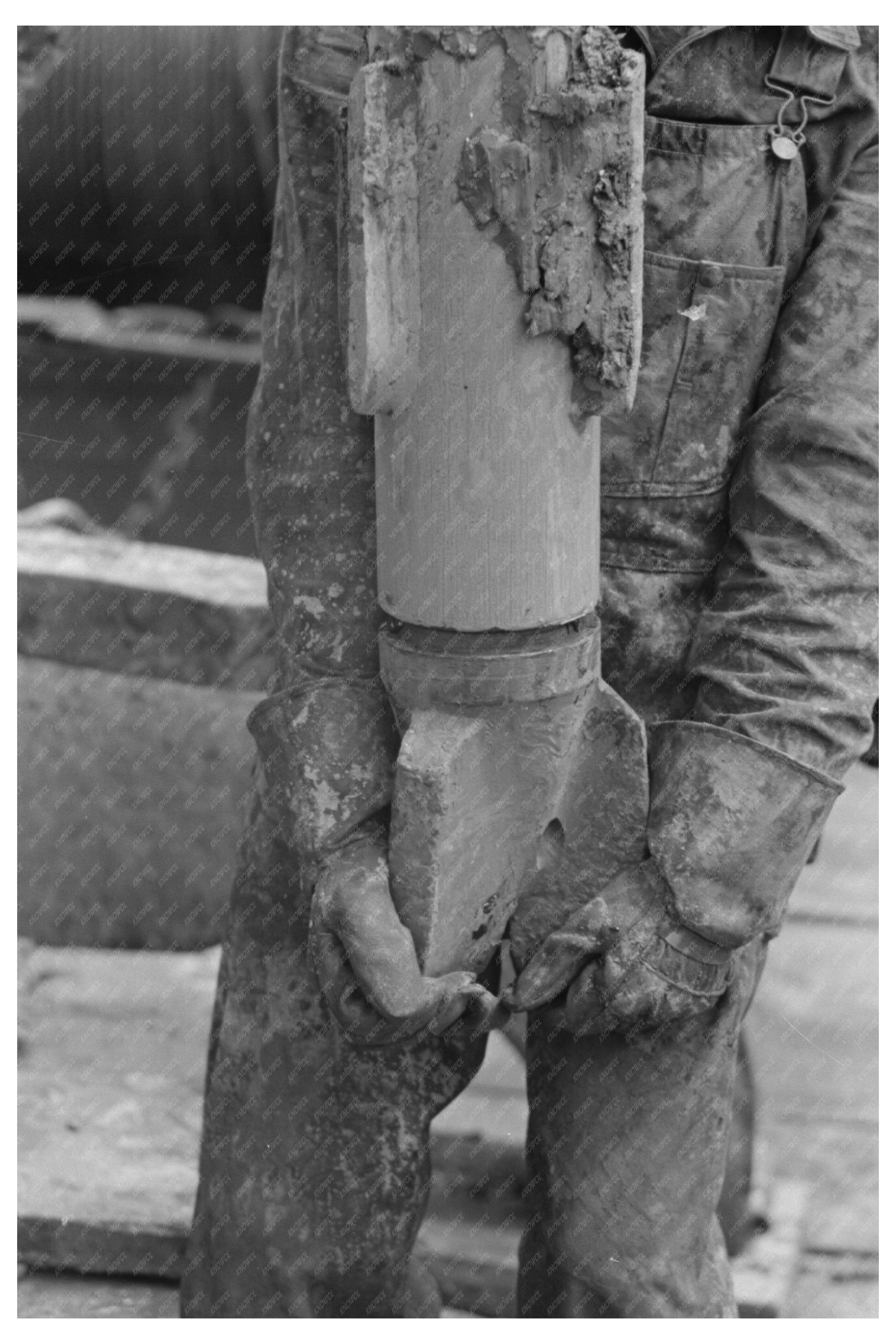 Oil Field Worker with Drilling Bit Kilgore Texas 1939