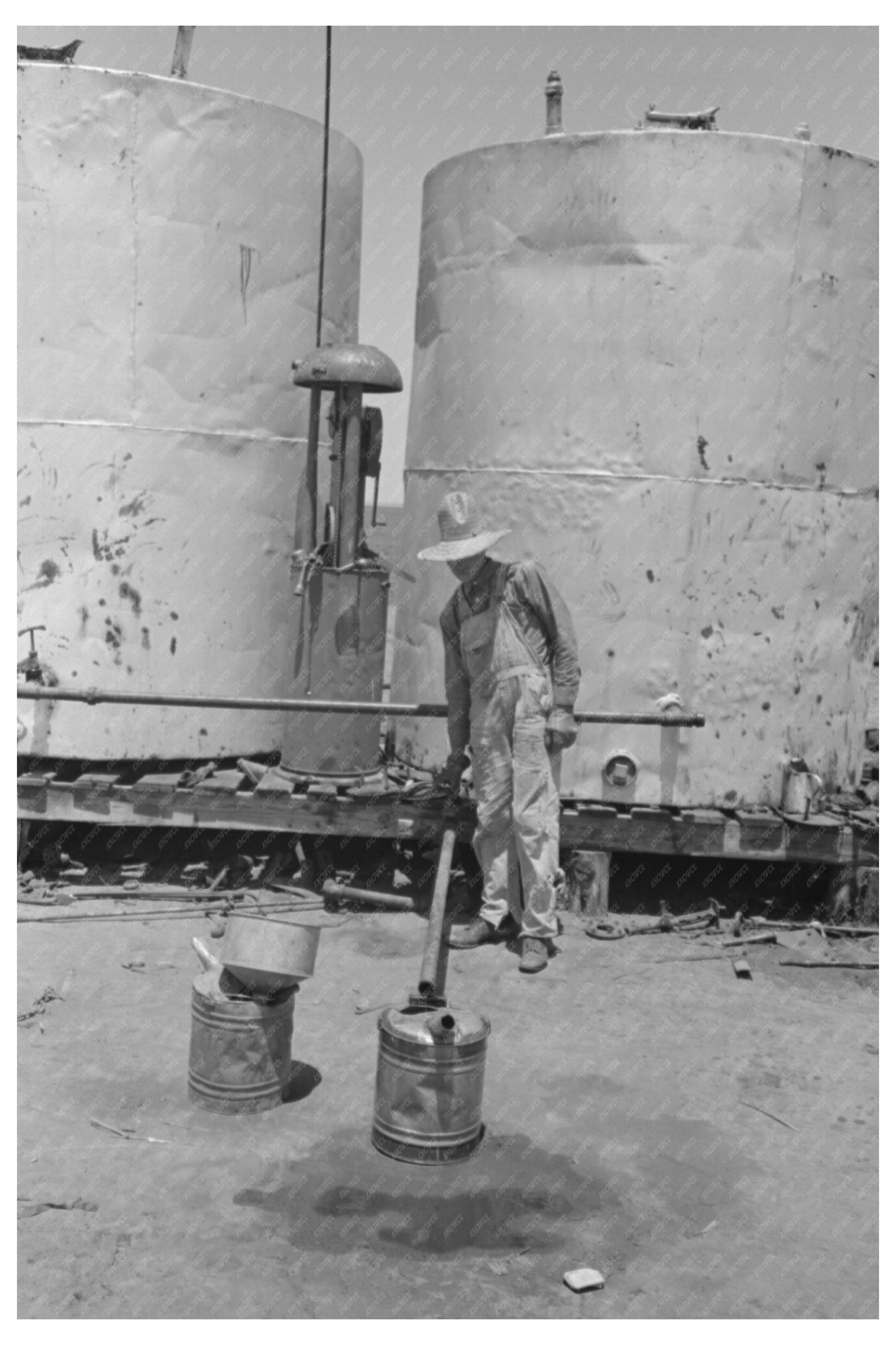 Man Pouring Gasoline into Tractor on Texas Farm 1939