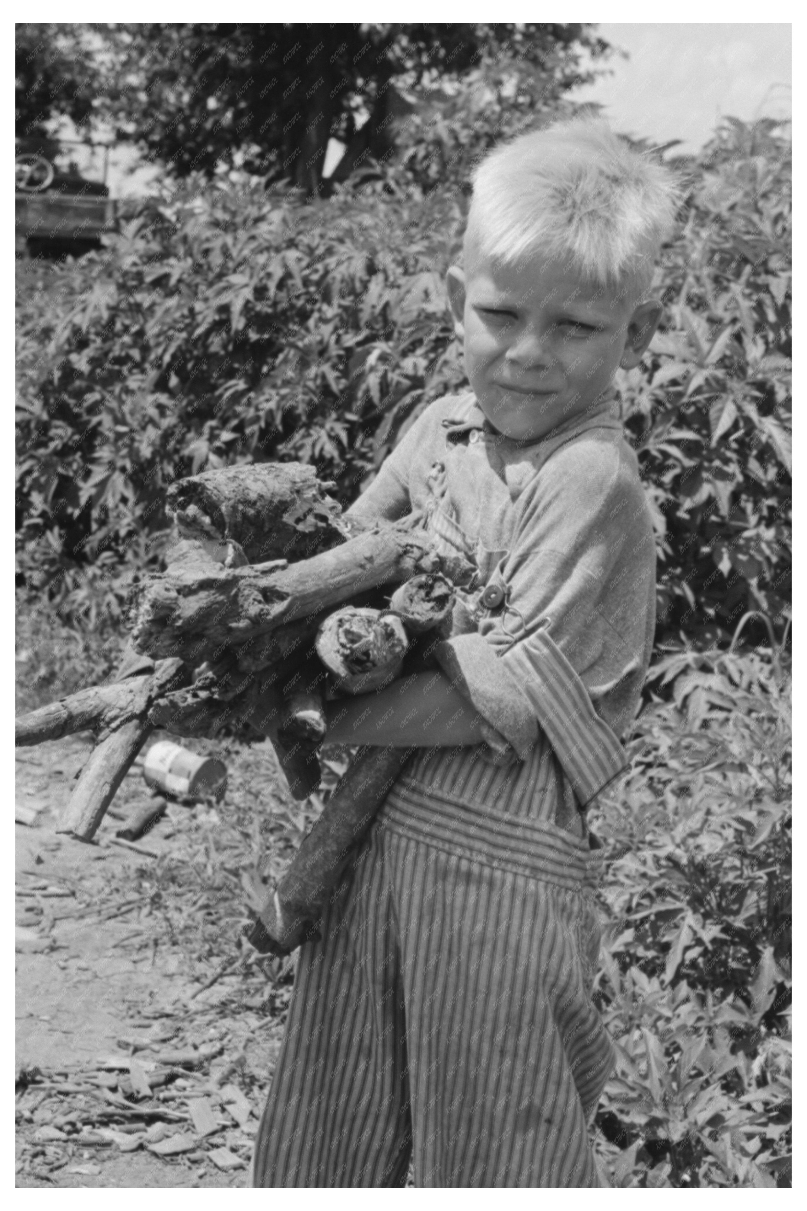 Young Boy Carrying Wood in Muskogee County 1939