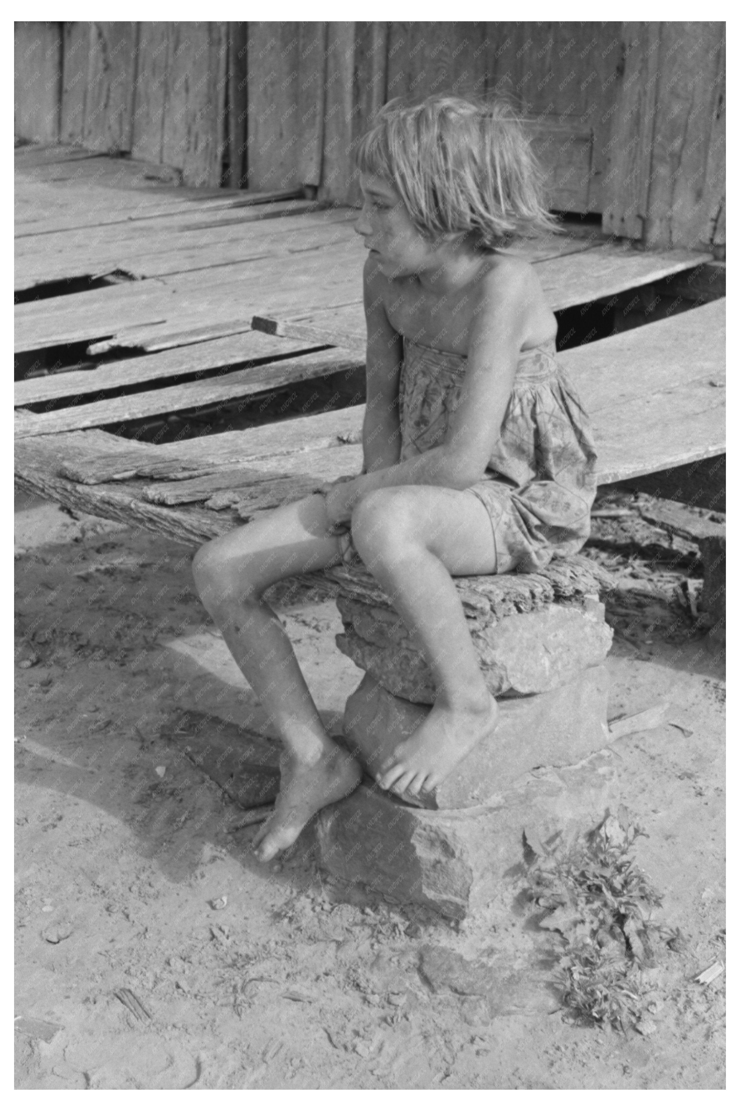 Daughter of Laborer on Porch McIntosh County Oklahoma 1939