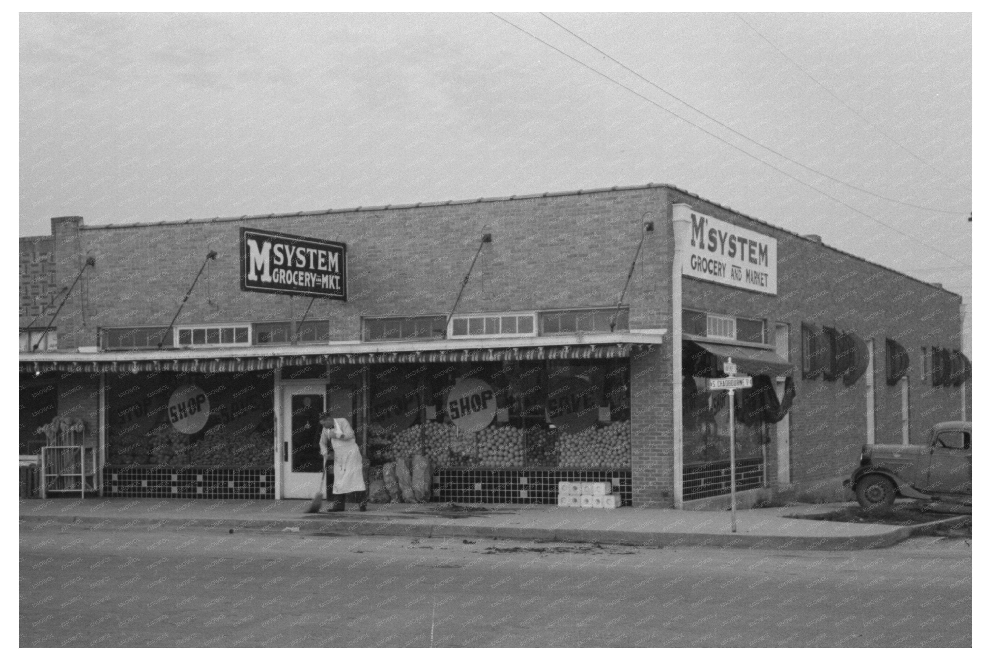 Vintage Worker Sweeping Sidewalk in San Angelo 1939