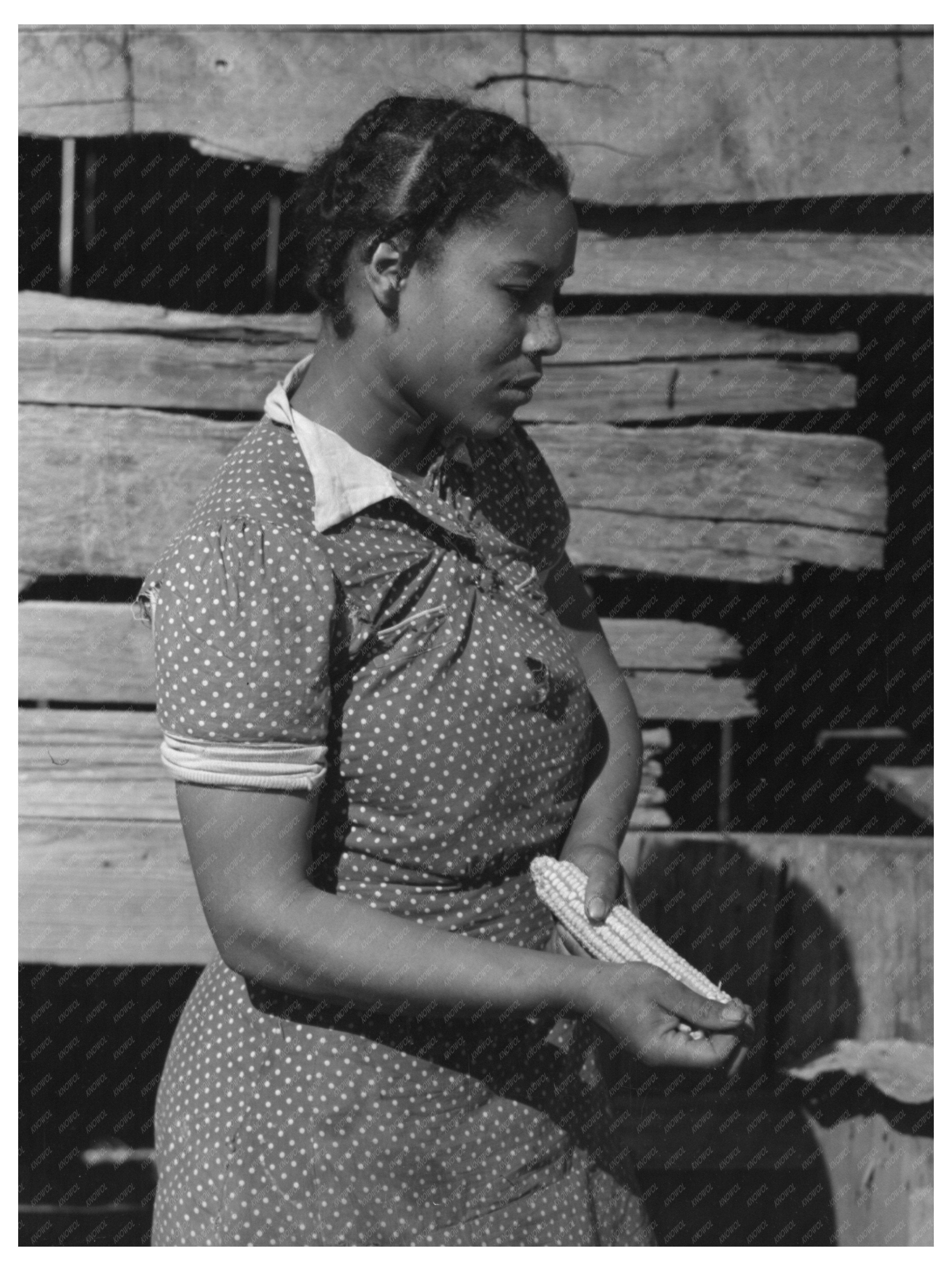 Daughter Shelling Corn for Chickens Oklahoma February 1940