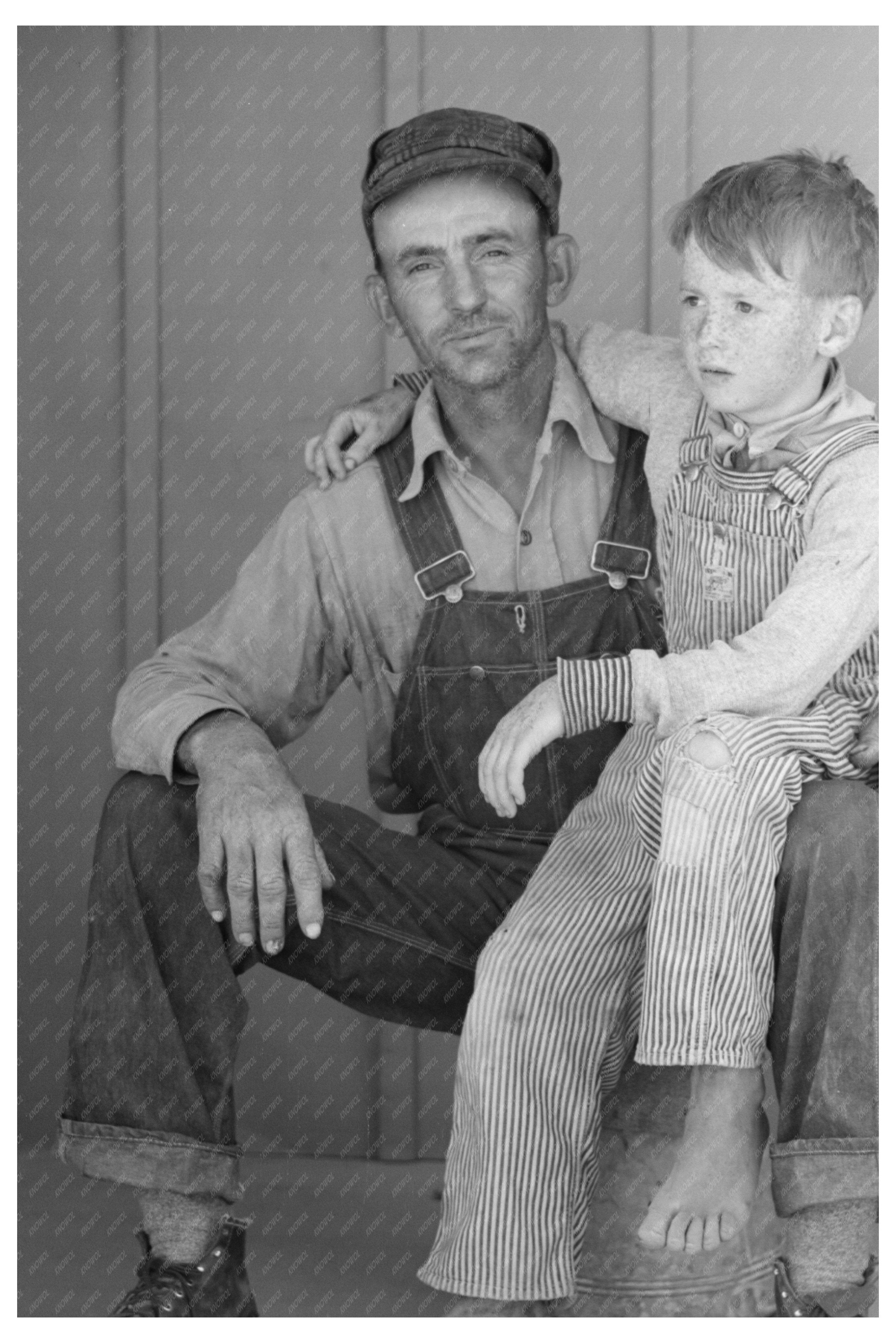Migratory Laborer and Son at Arizona Camp May 1940