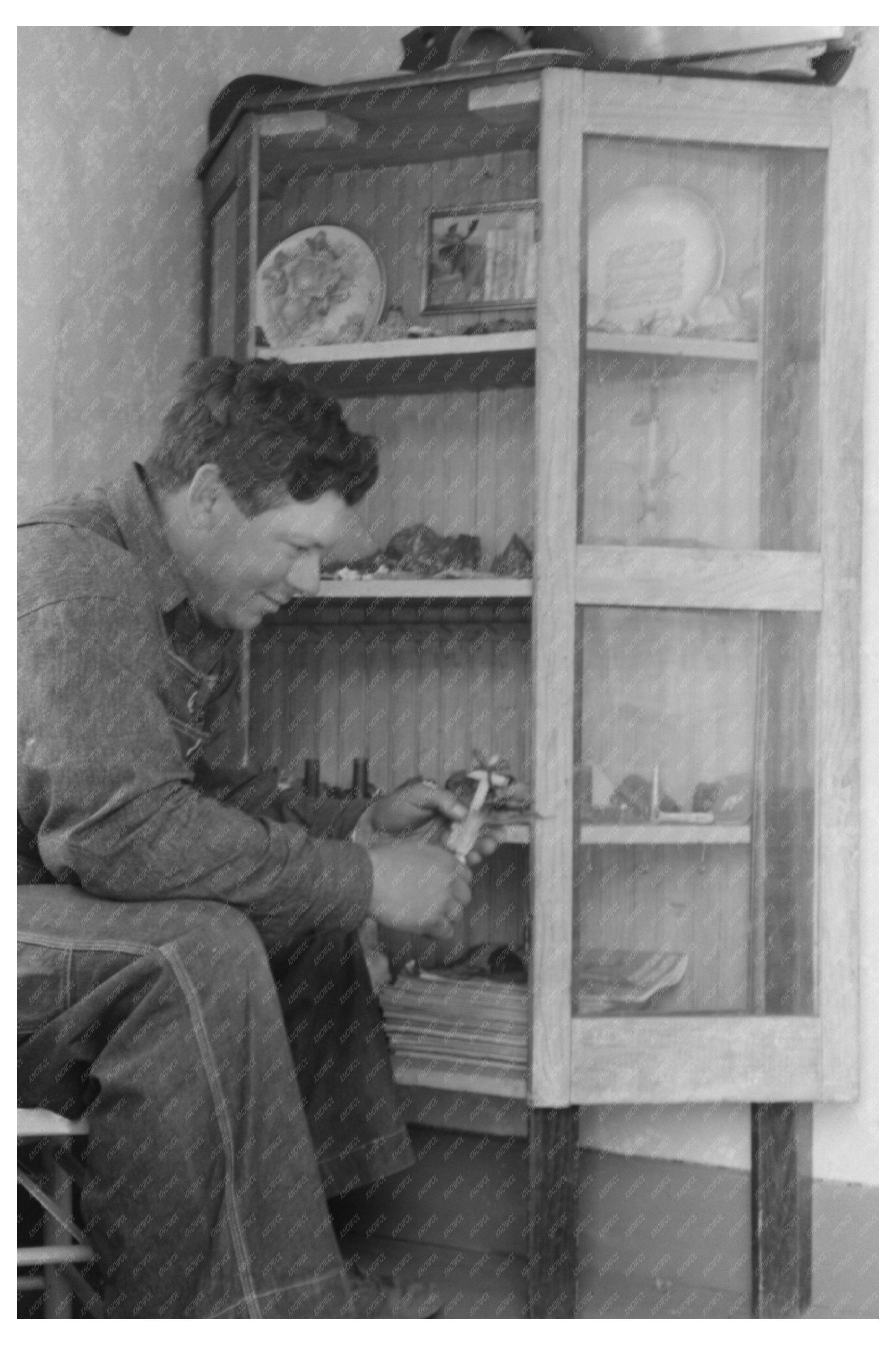 George Hutton Jr. Examines Indian Fetish in Pie Town 1940