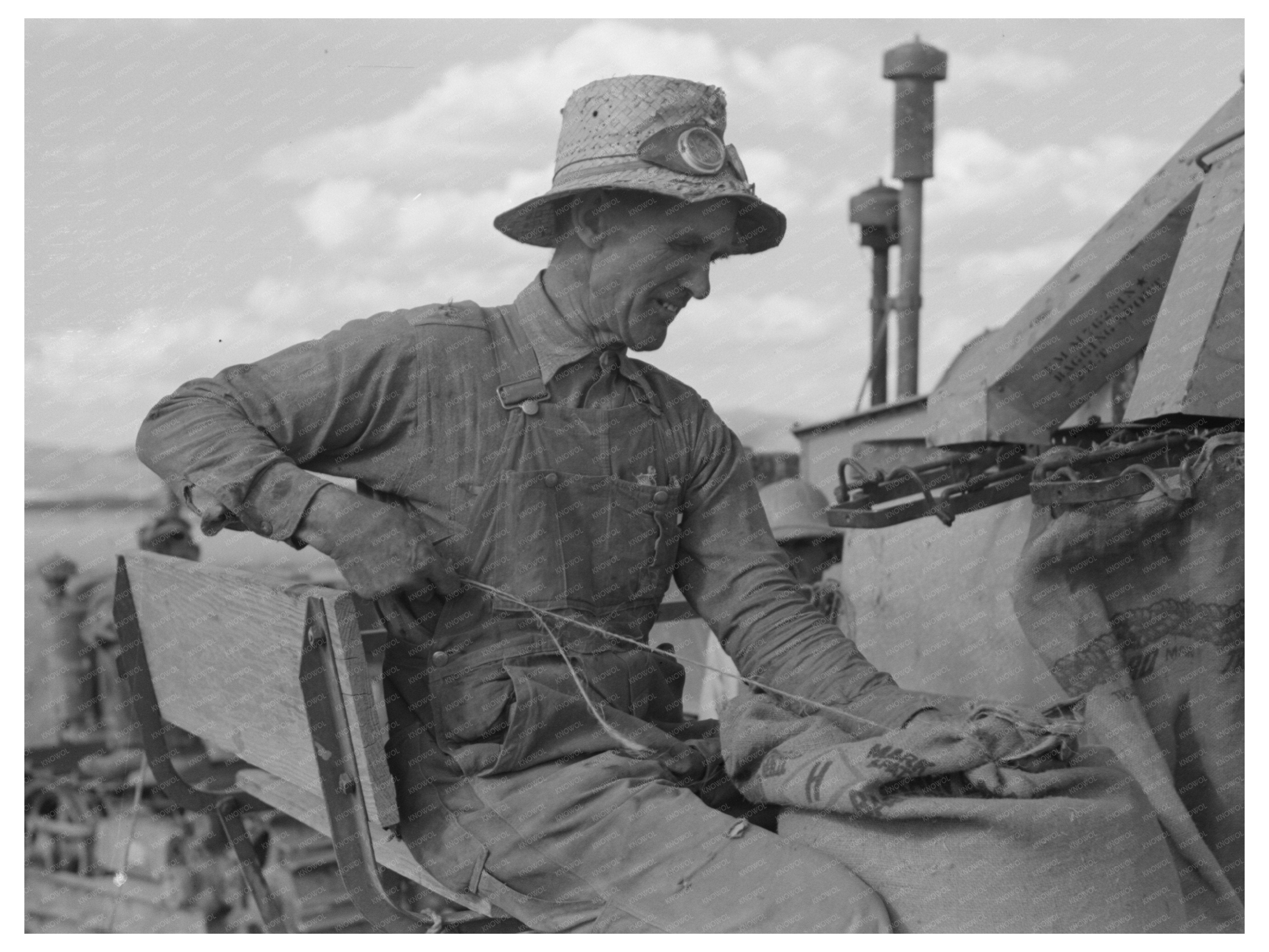 Mormon Farmer Bagging Wheat in Idaho July 1940