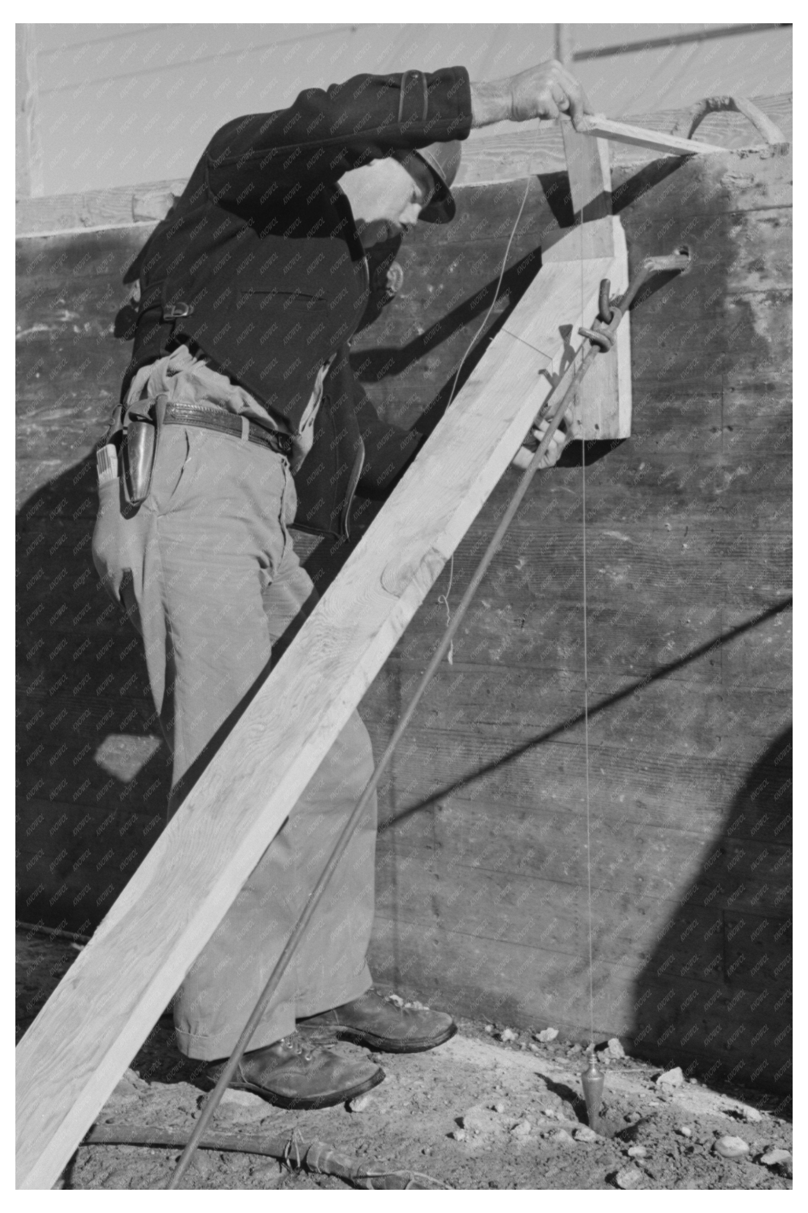 Worker Inspects Shasta Dam Construction December 1941