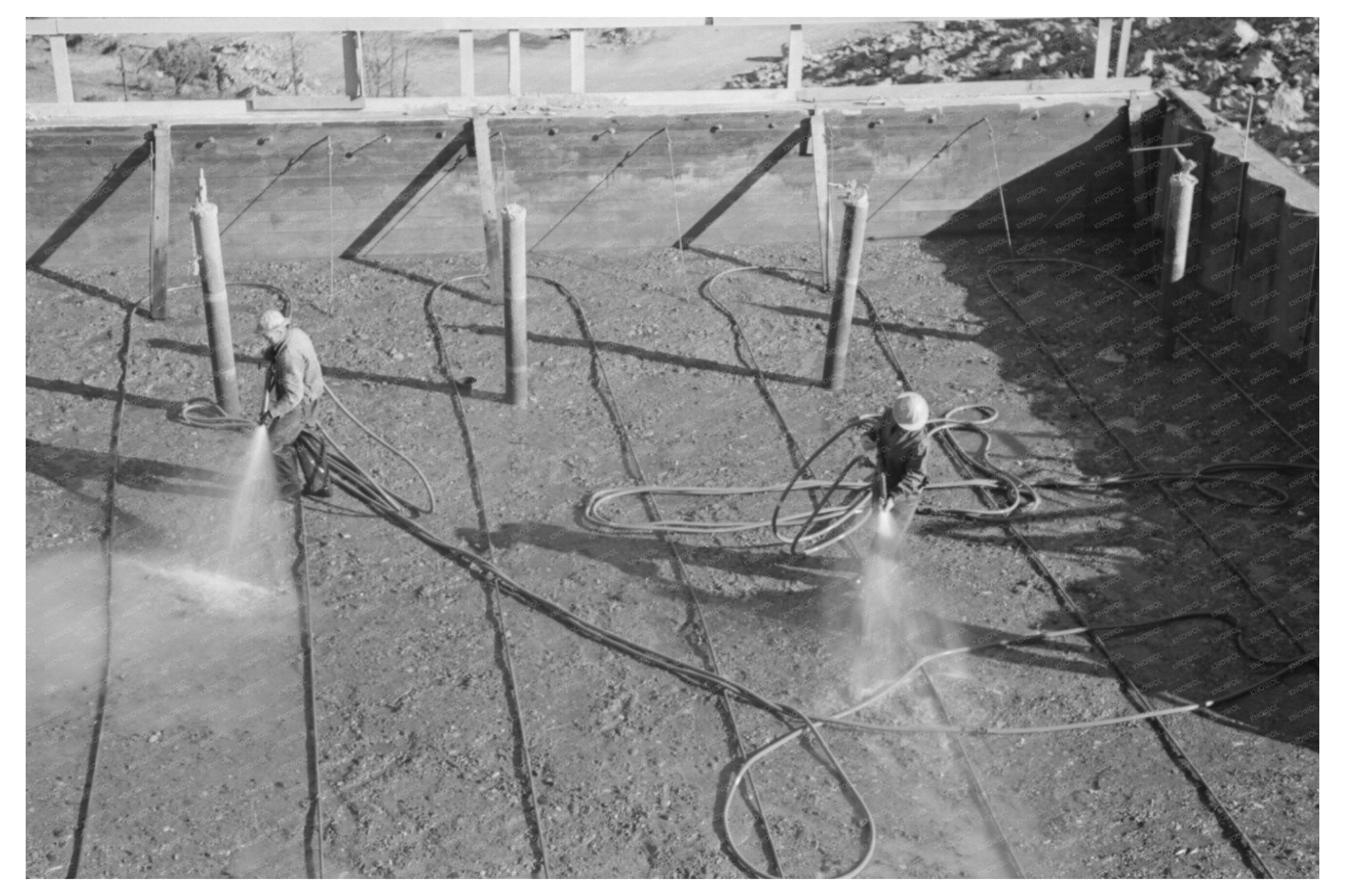 Wetting Fresh Concrete at Shasta Dam December 1941