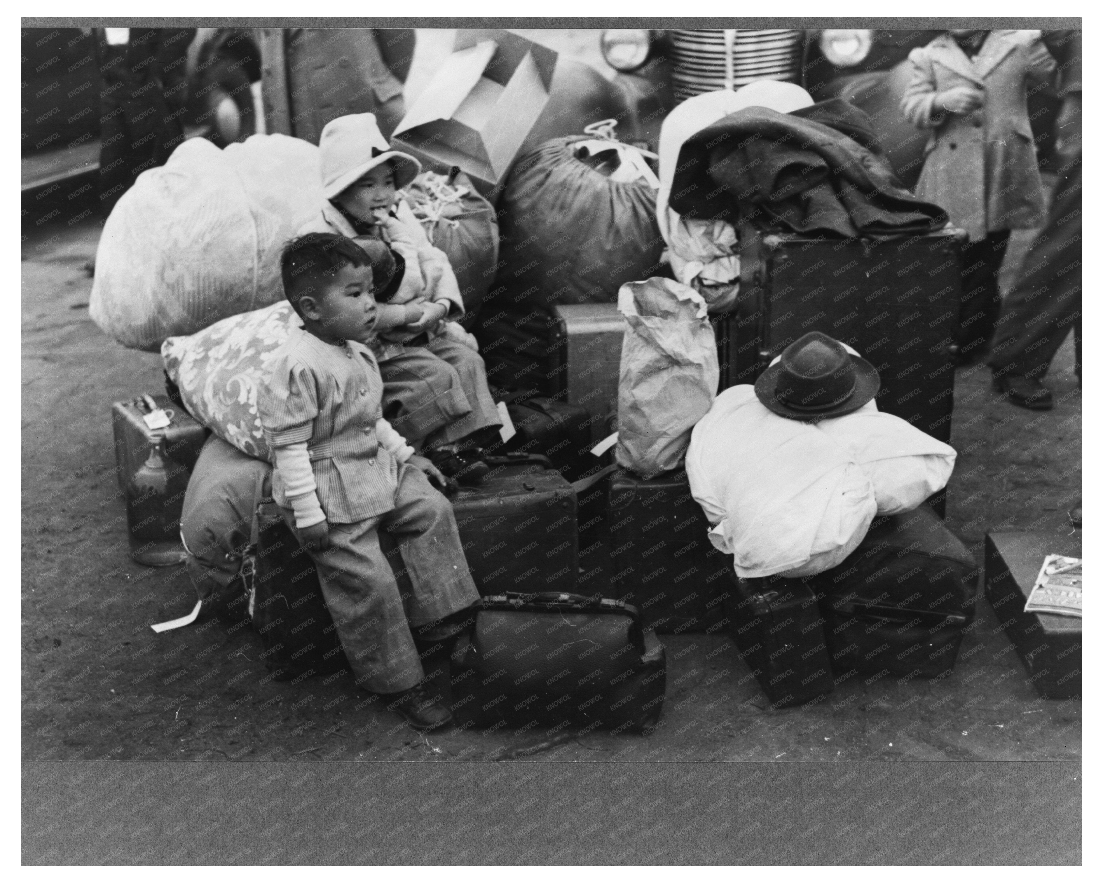 Japanese-Americans Await Train to Owens Valley April 1942