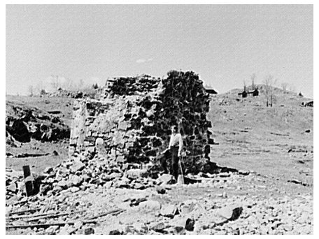 Mr. Henrickson by Abandoned Smokestack Mansfield 1937