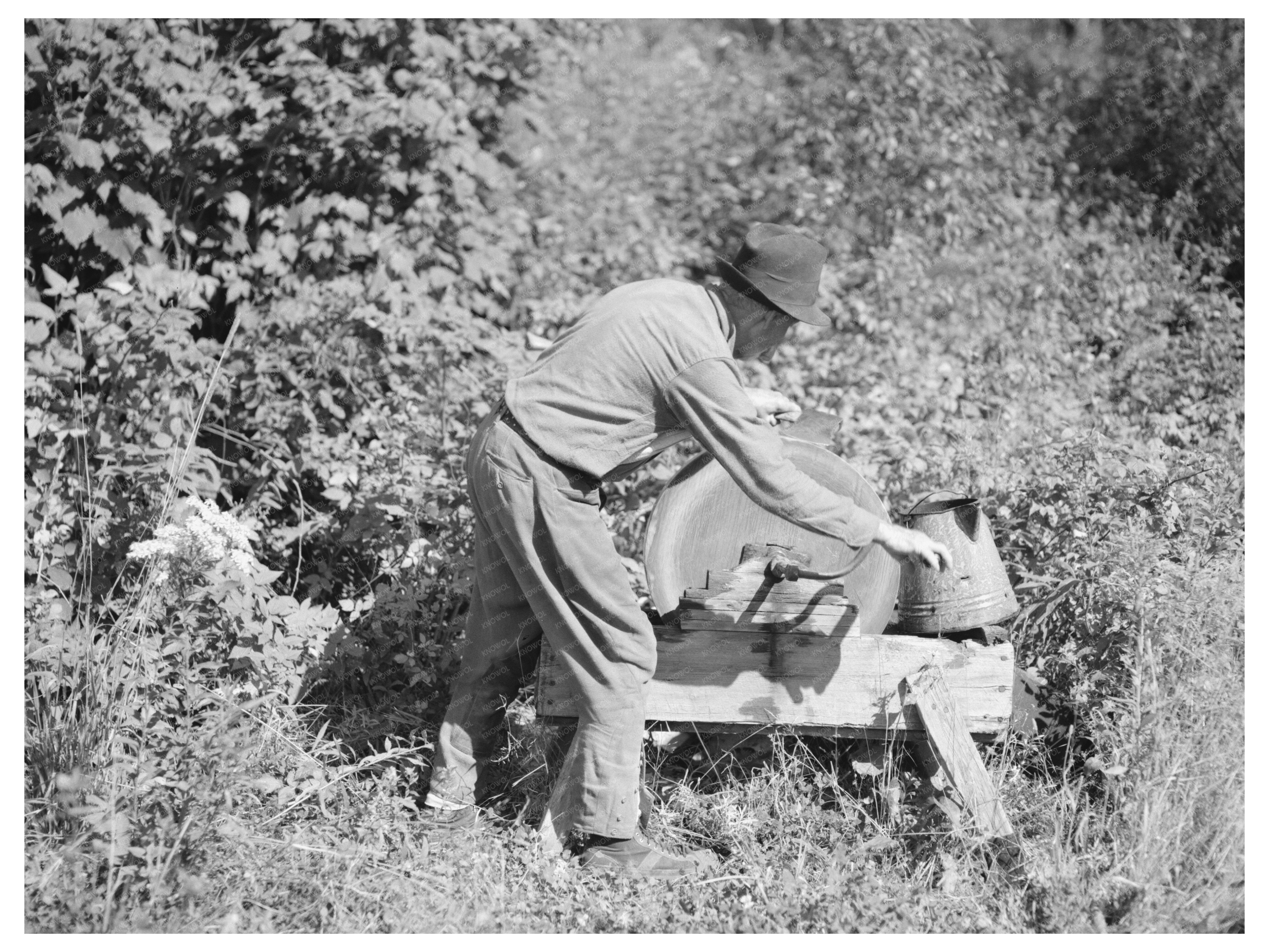William Besson Grinding Axe Winton Minnesota August 1937