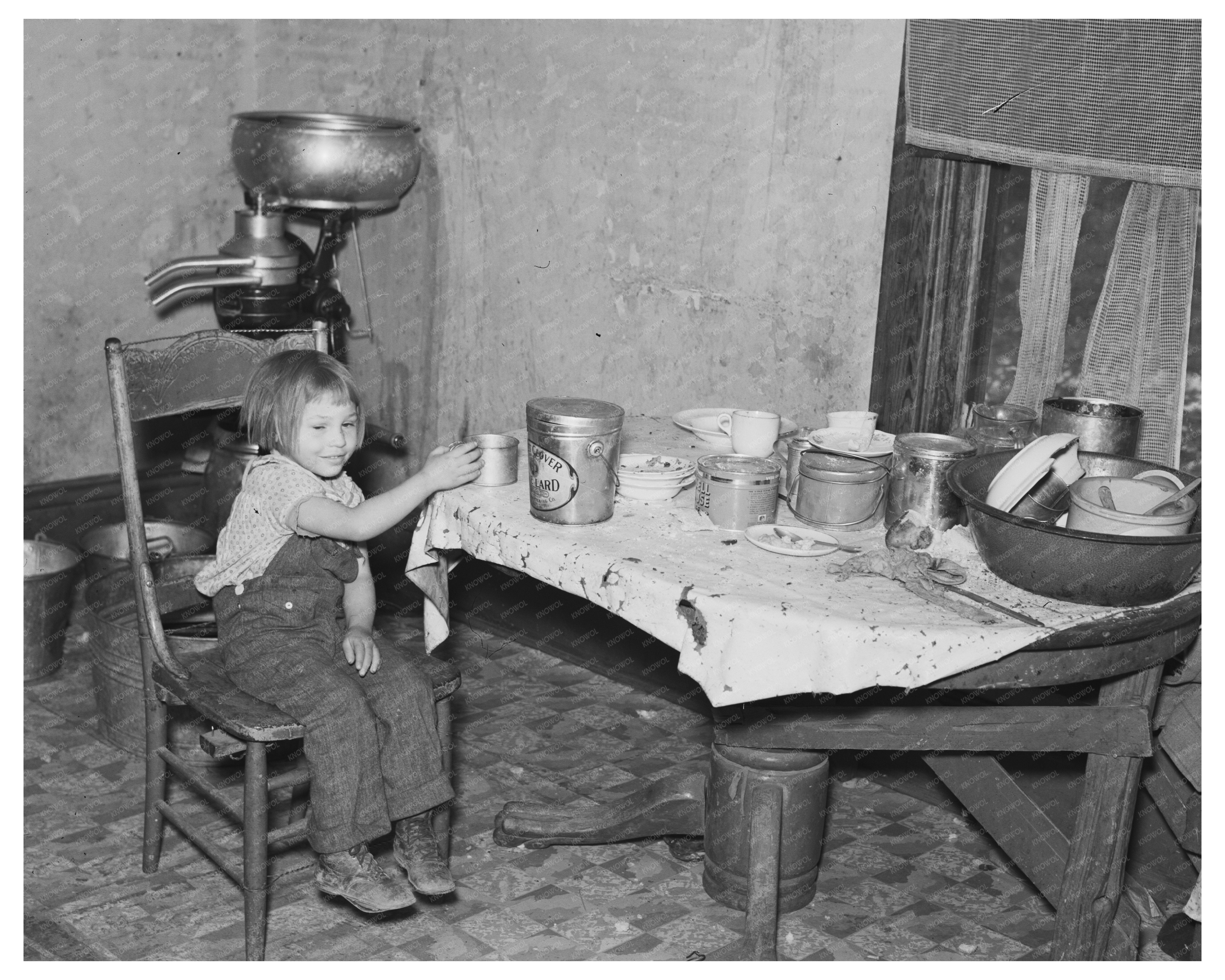 Daughter of John Baker in North Dakota Kitchen 1937
