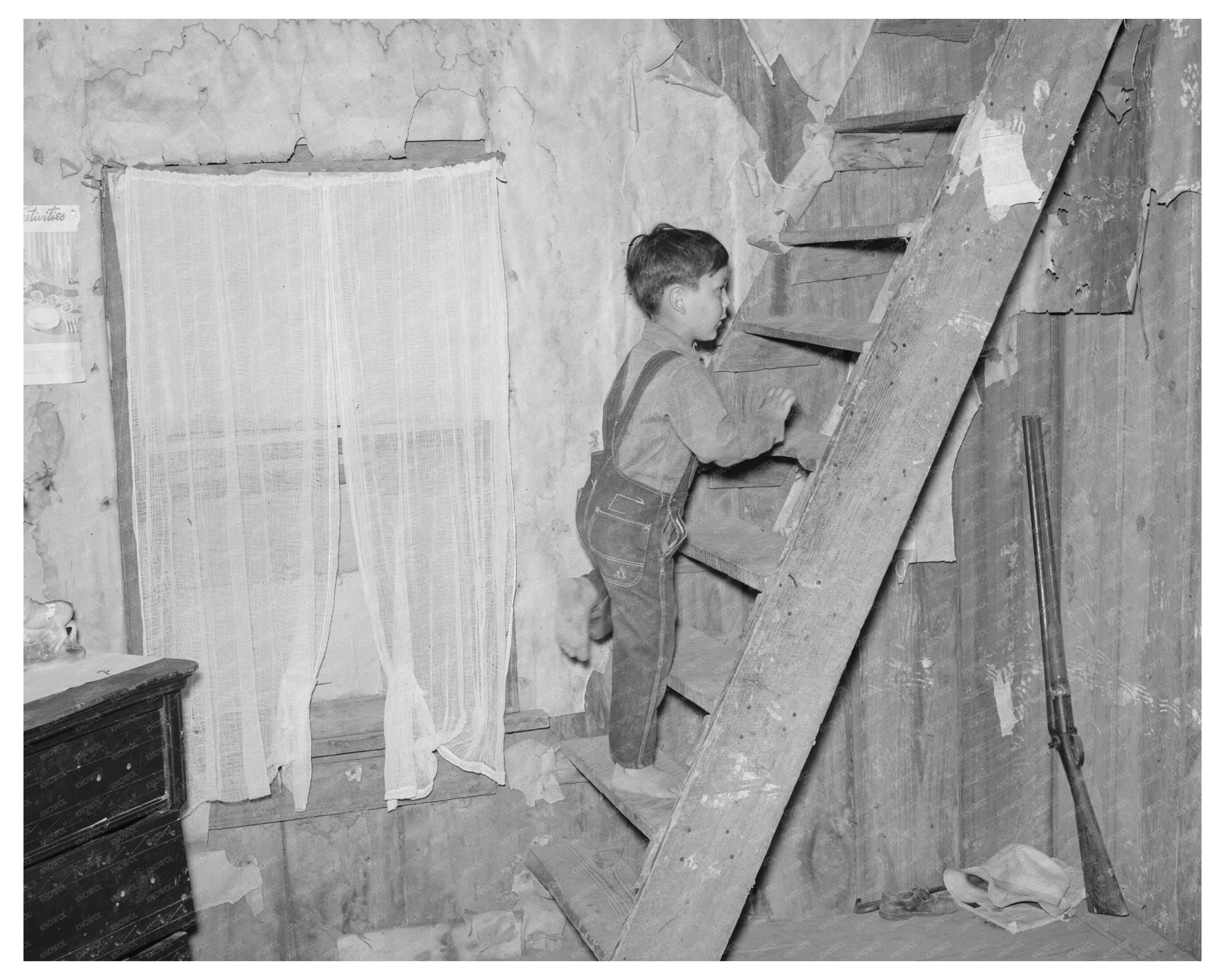 Sharecroppers Son Climbing Stairs in Missouri 1938