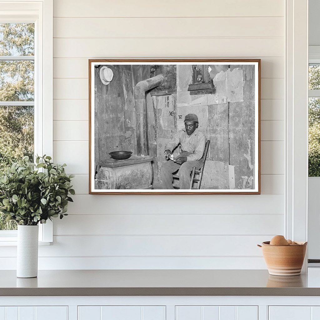 Sharecropper Rolling Cigarette in Missouri Shack 1938