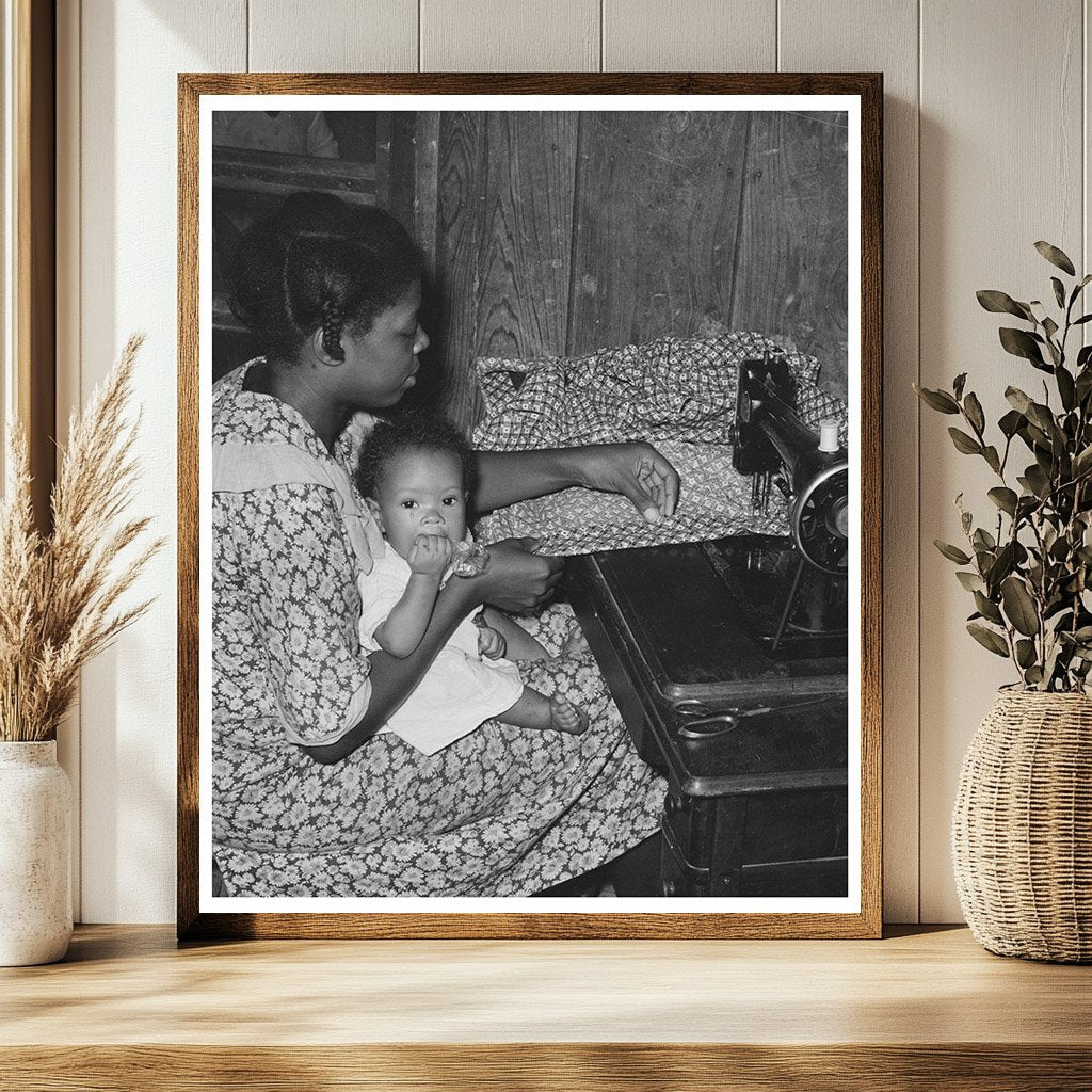 Sharecroppers Wife Sewing with Baby August 1938 Missouri