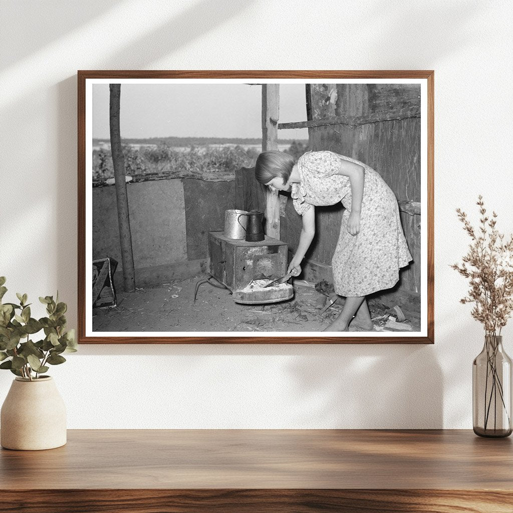 Girl Tending Fire in Tin Shack Caruthersville 1938