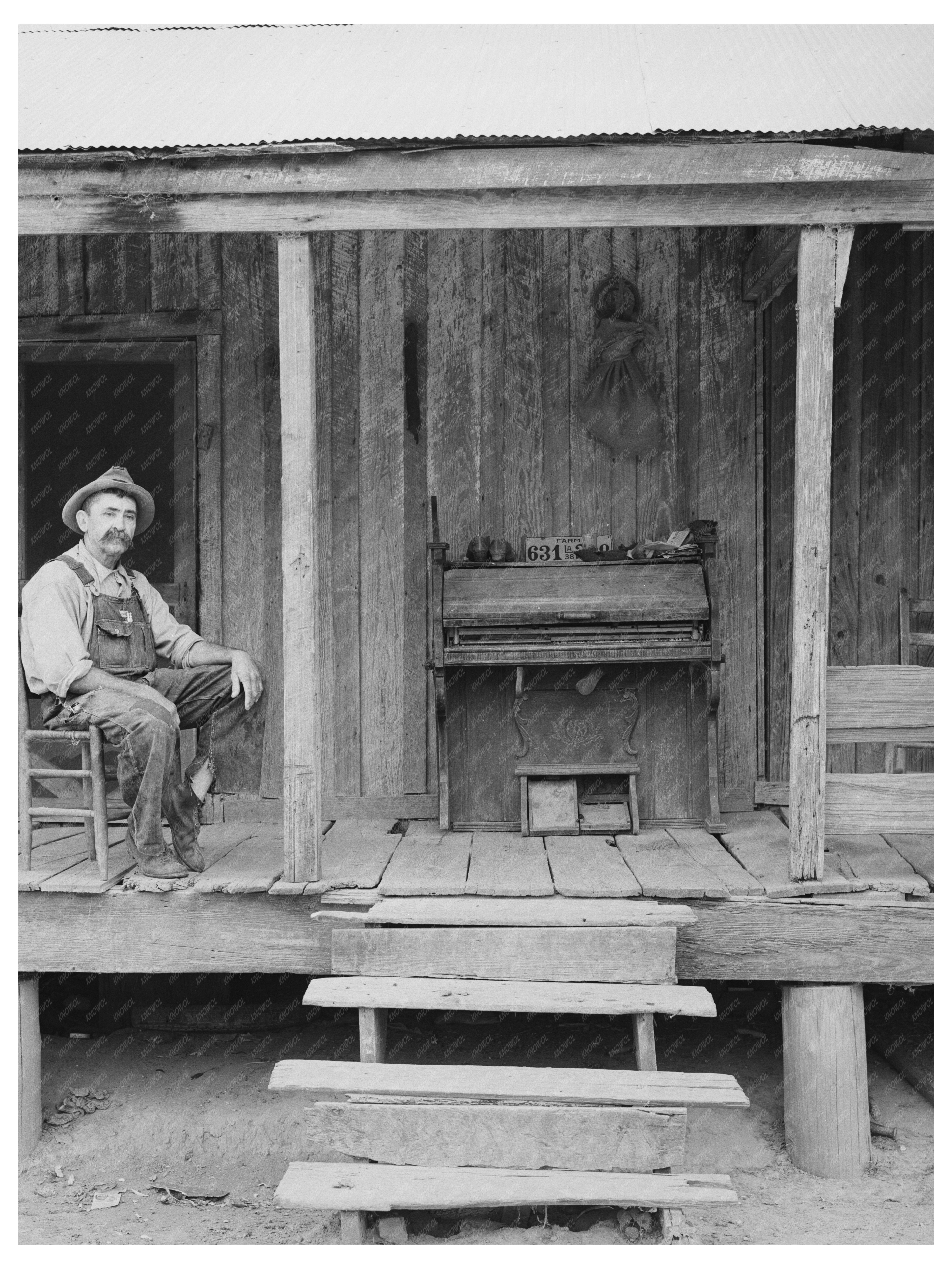 Tenant Farmer W.E. Smith on Porch Morganza Louisiana 1938