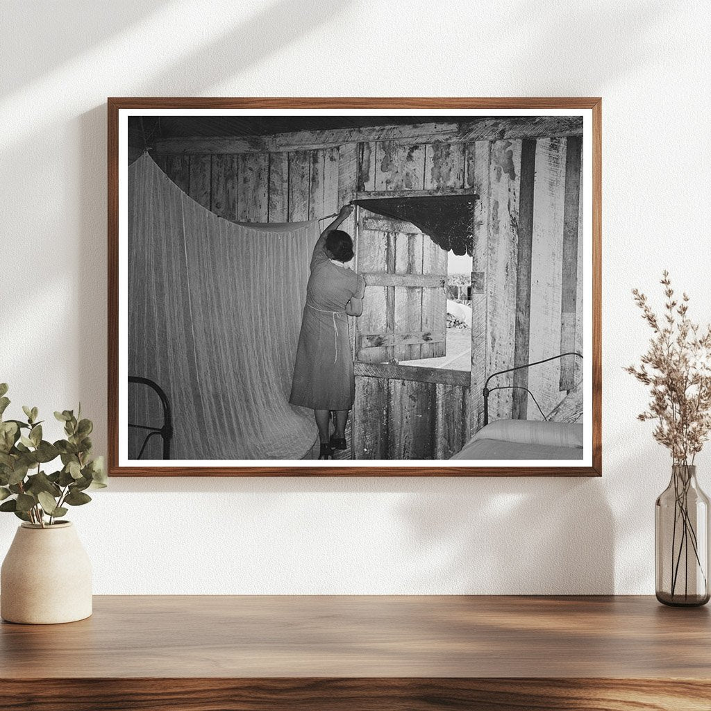 Mrs. Emil Kimball Sweeping Kitchen in Louisiana 1938