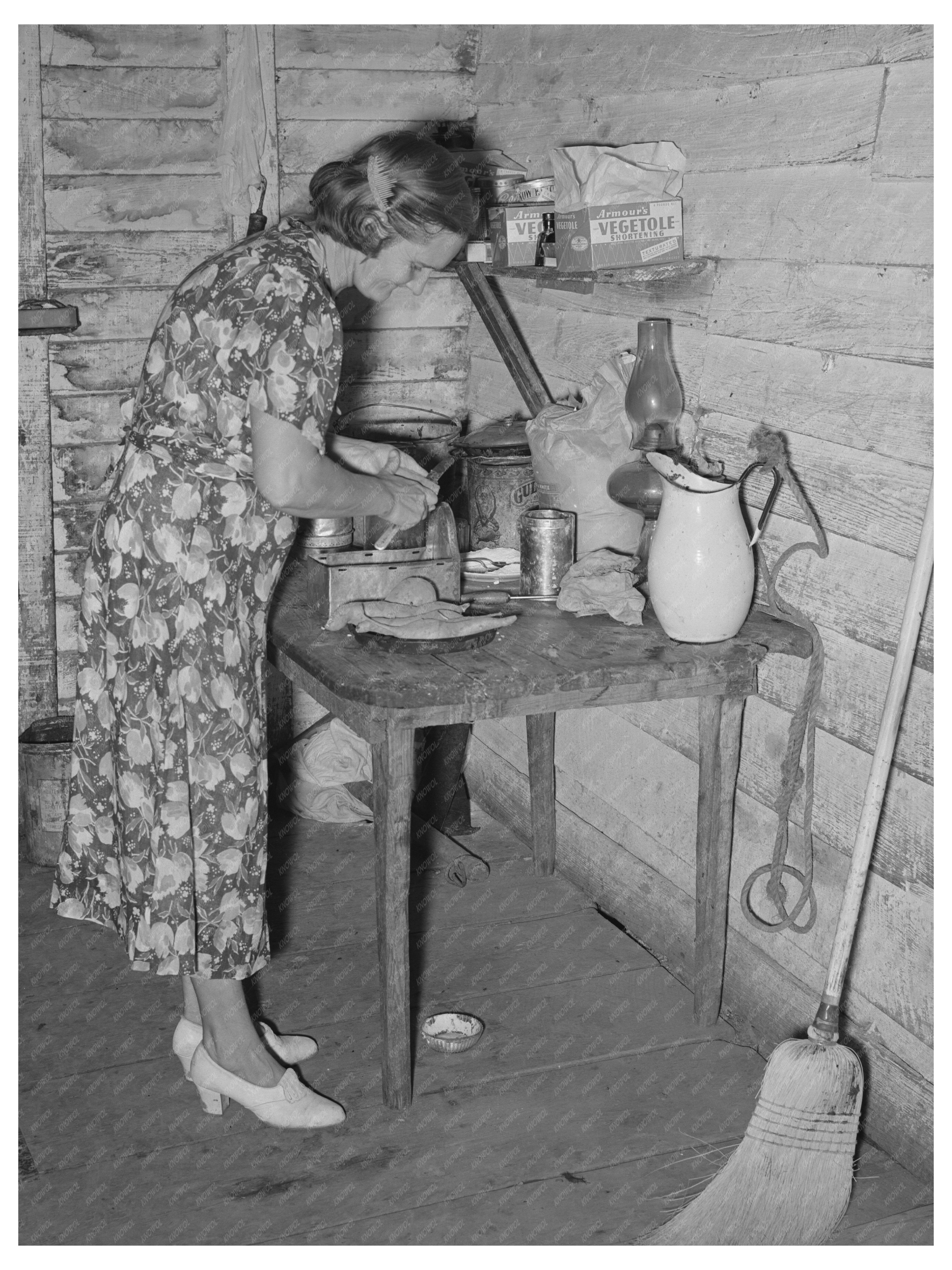 Mrs. Adams Prepares Sweet Potatoes in Louisiana 1938