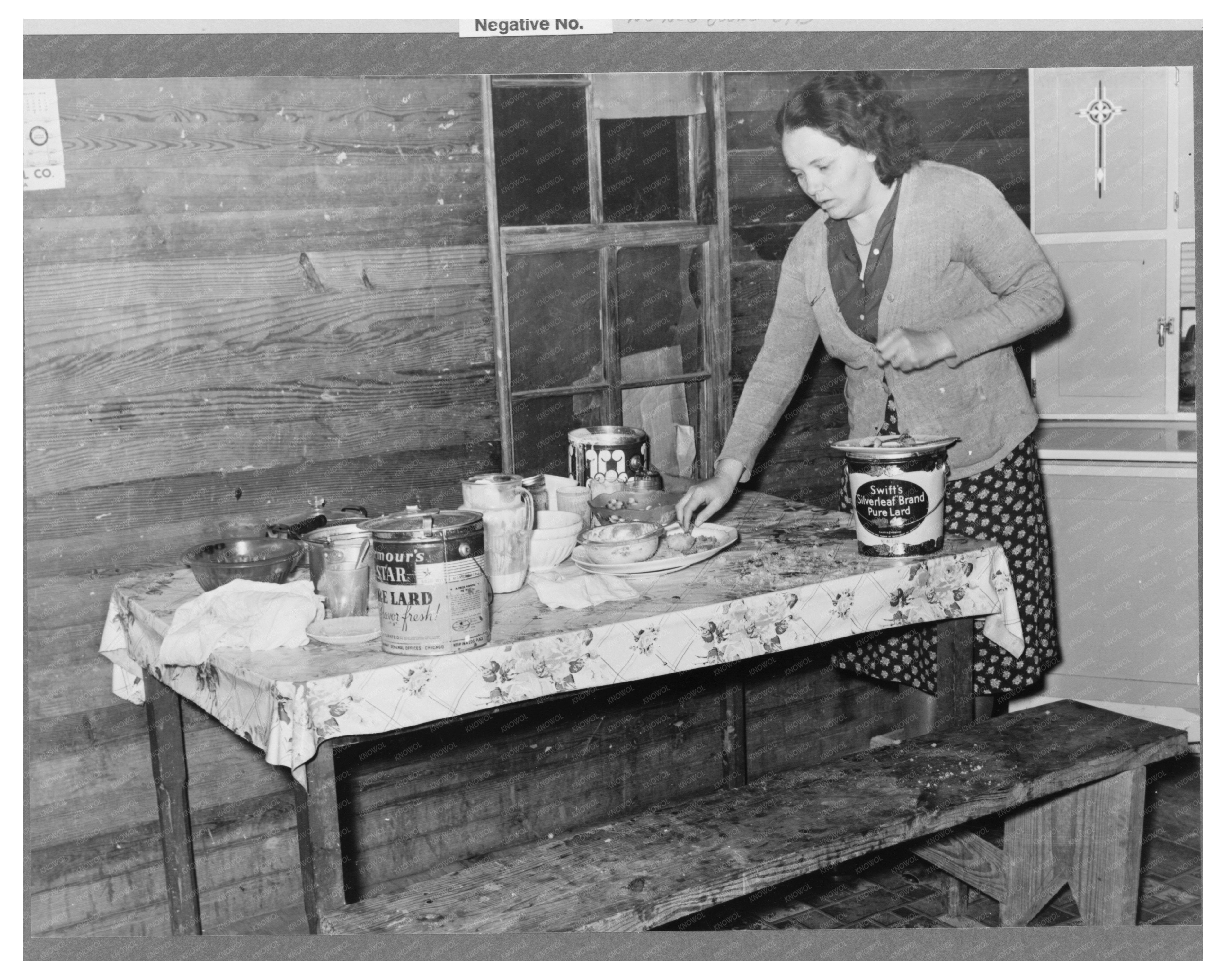 1939 Woman Cleaning Kitchen in Tenant Farmers Home Mississippi