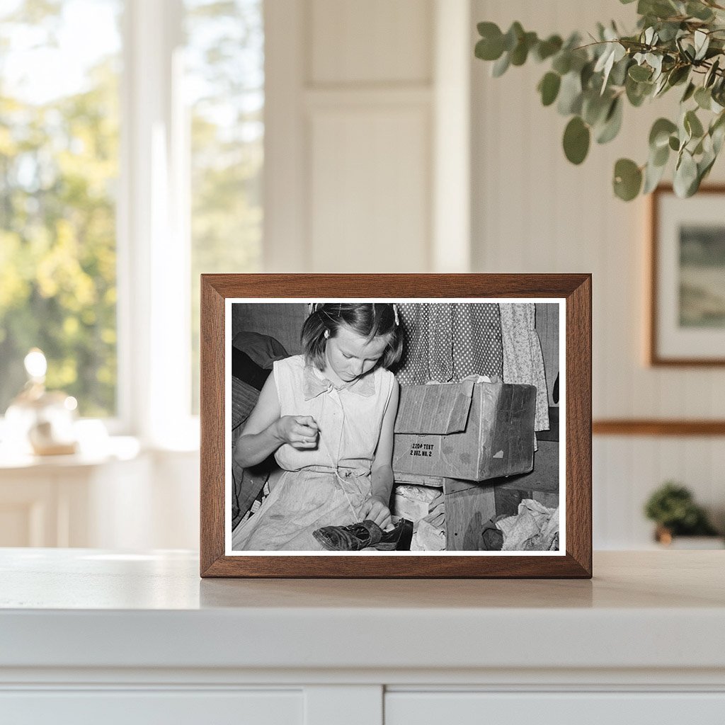 Migrant Girl Repairing Shoes in Sebastian Texas 1939