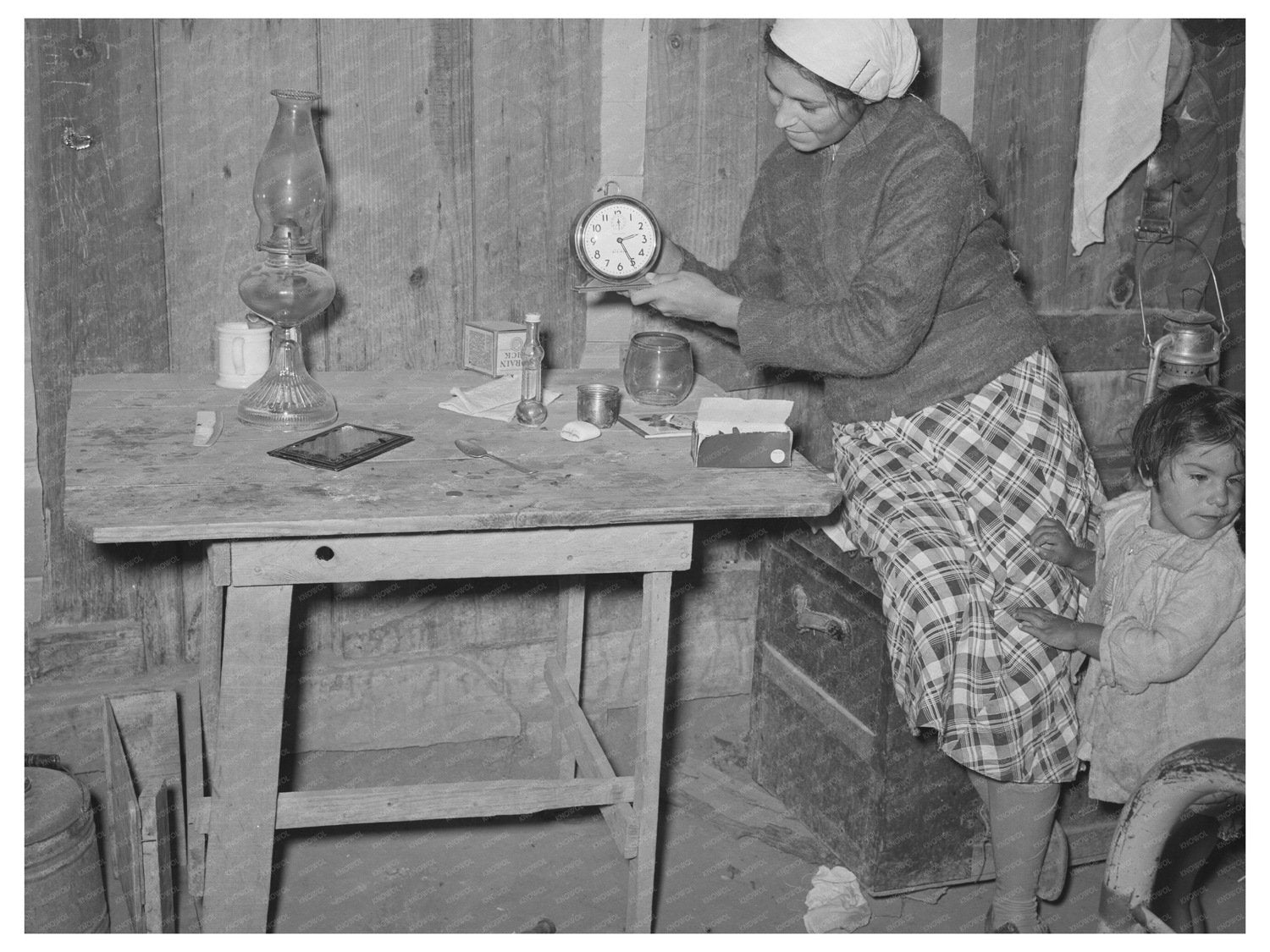 Mexican Woman Setting Clock in Crystal City 1939