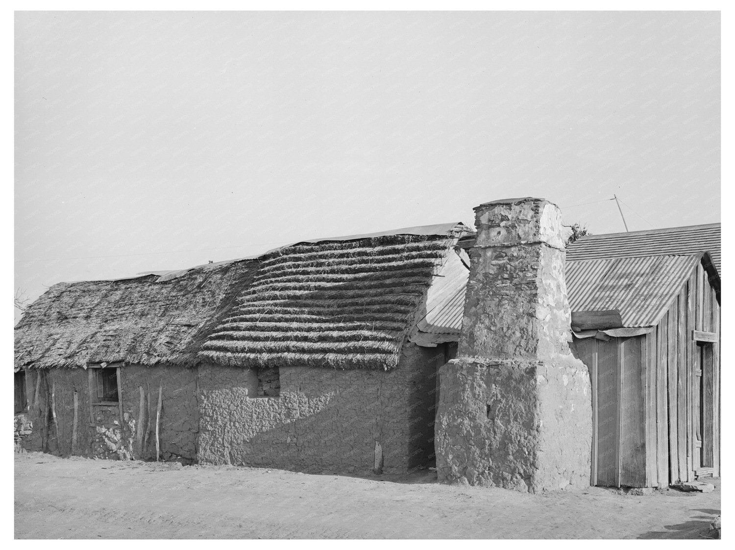 Vintage Adobe House with Palmetto Roof in Texas 1939