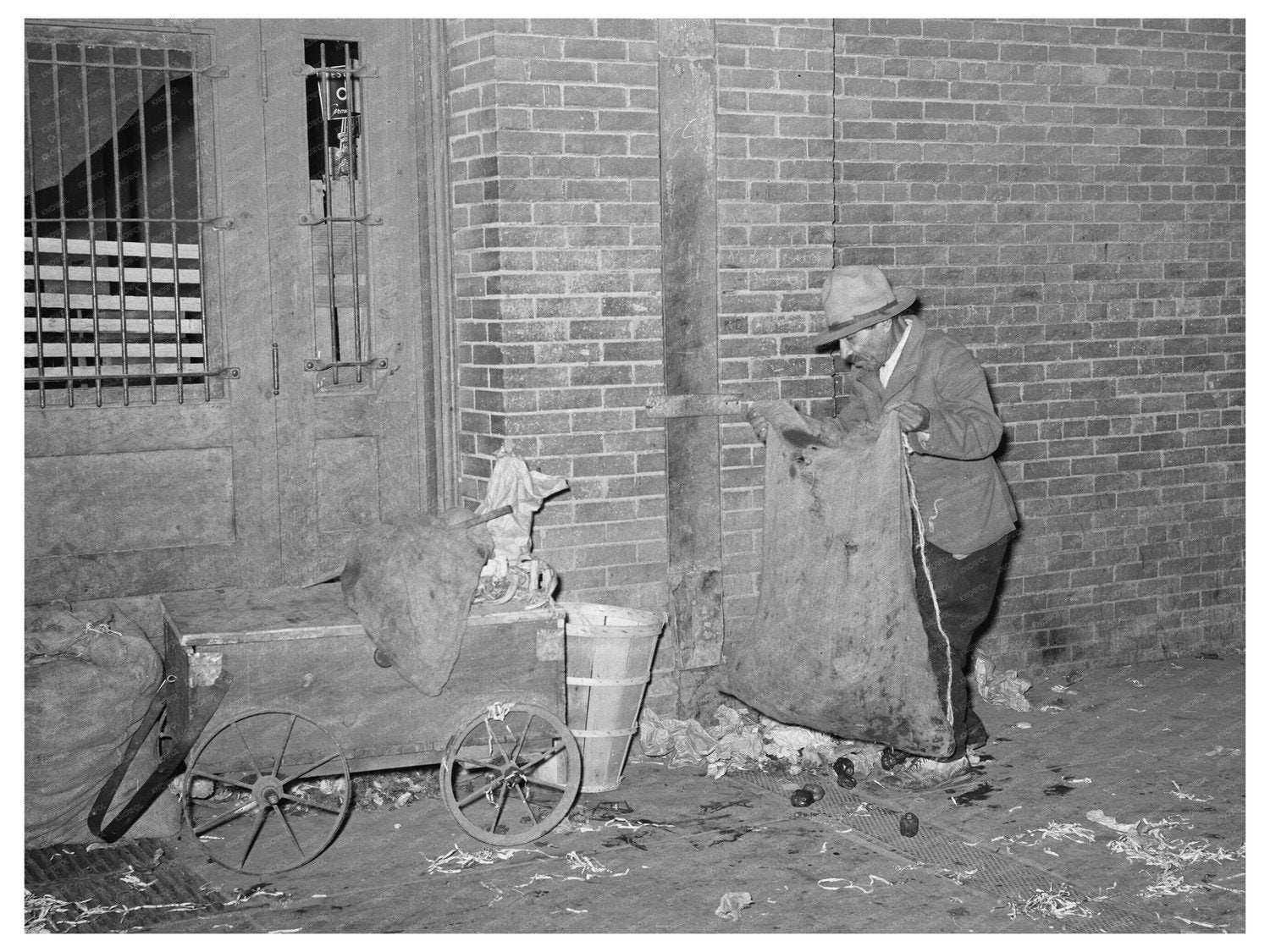 Mexican Man Collecting Refuse at San Antonio Market 1939