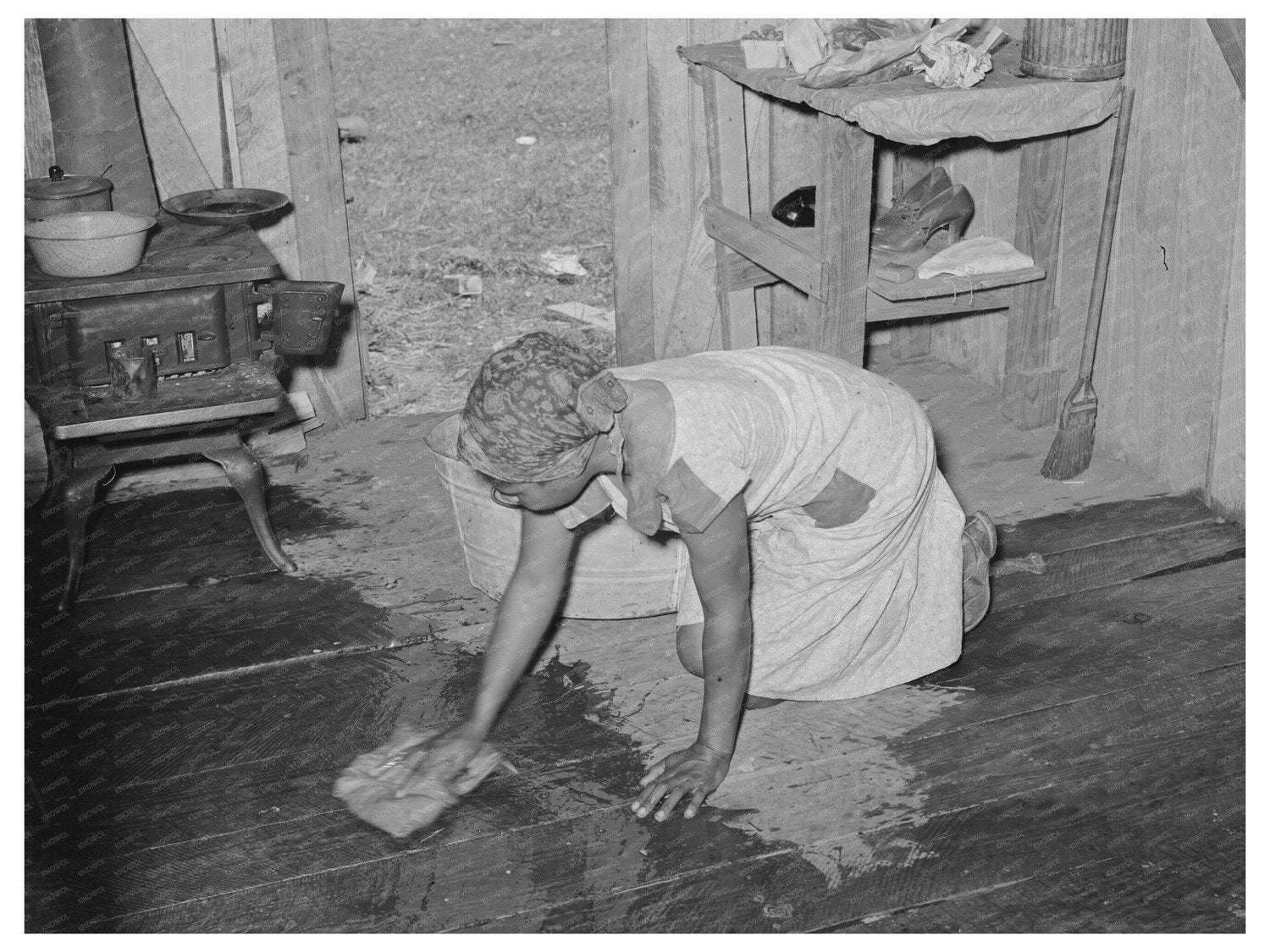 Vintage 1939 Woman Doing Household Chores in Louisiana