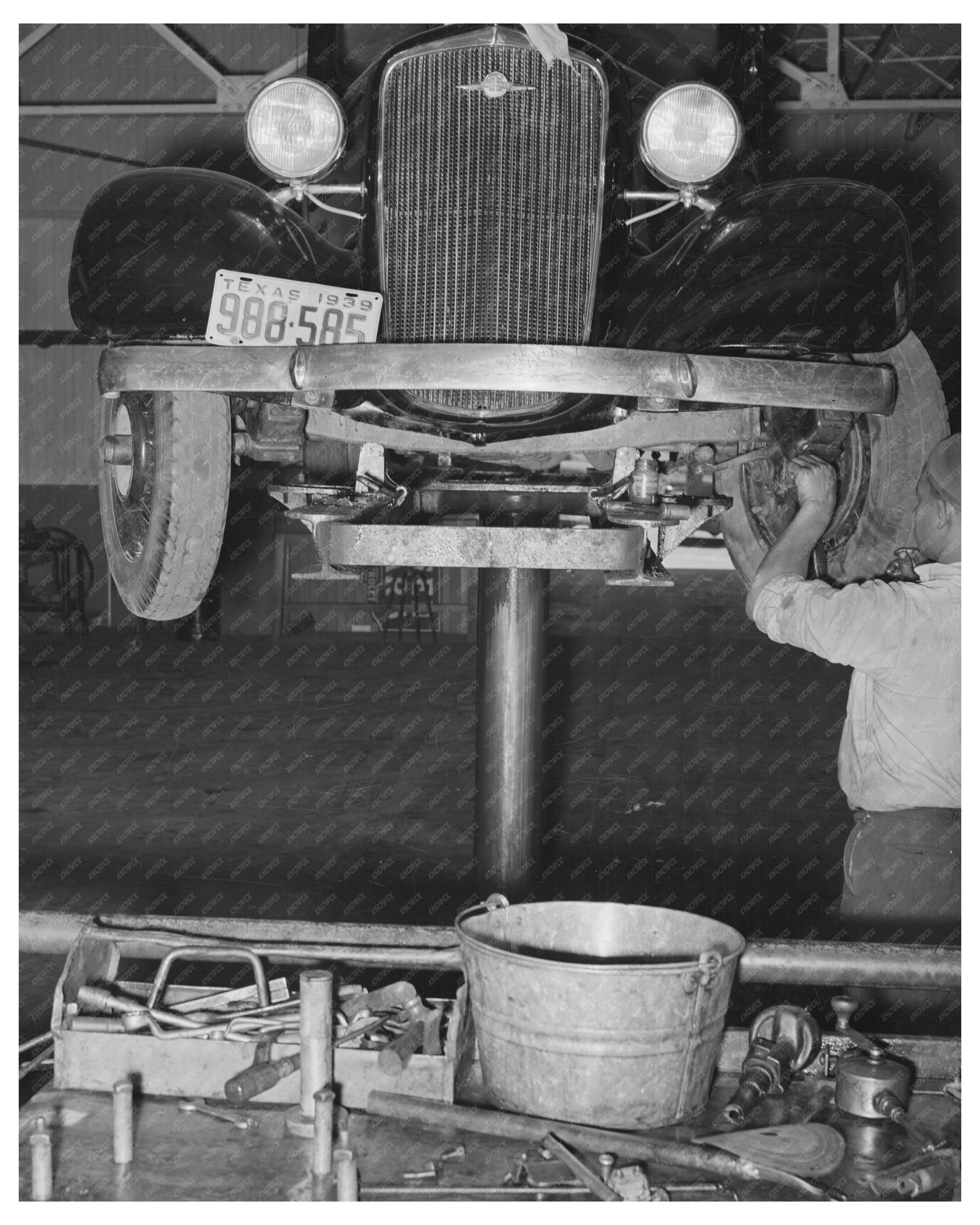 Greasing an Automobile in San Augustine Texas April 1939