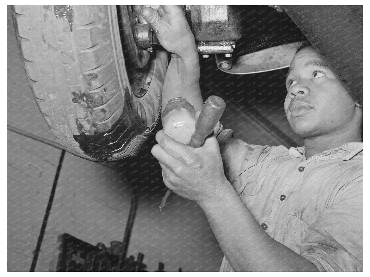Greasing Automobile in Garage San Augustine Texas 1939