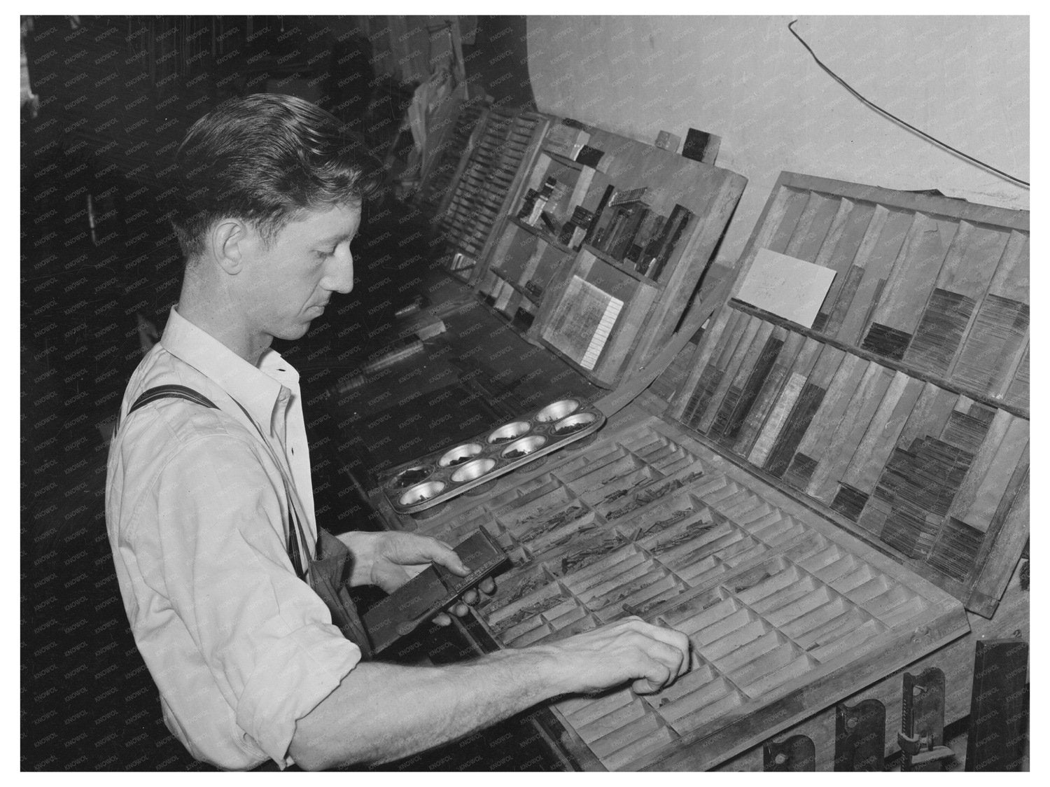 Hand Setting Type in San Augustine Texas April 1939