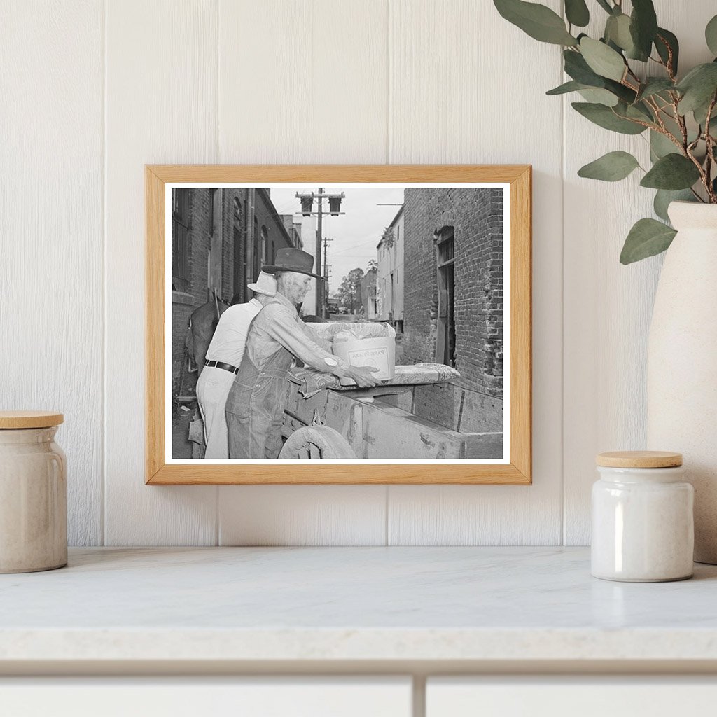 Farmer Loading Wagon in San Augustine Texas April 1939