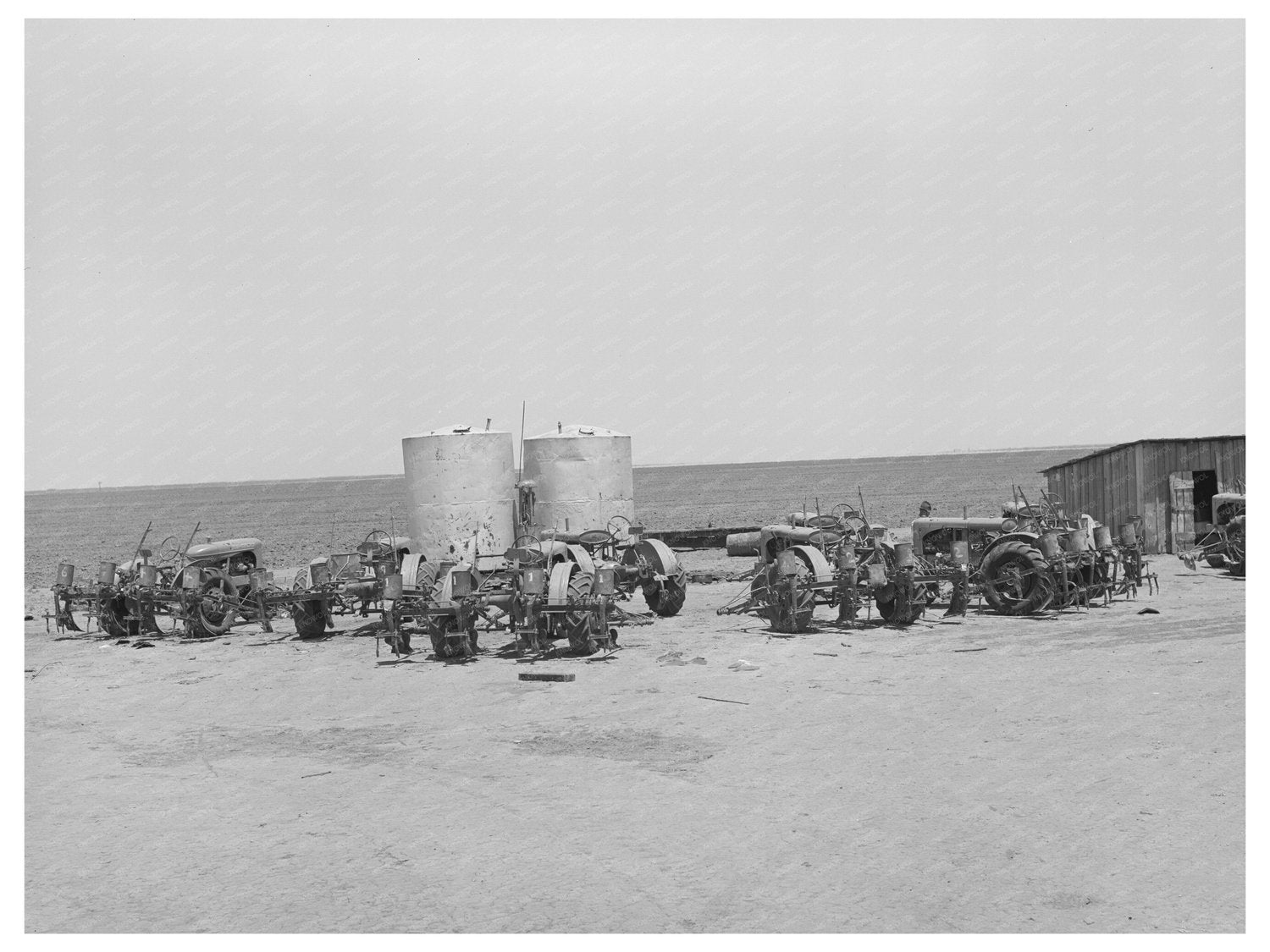 Tractors by Gasoline Tanks on Texas Farm May 1939